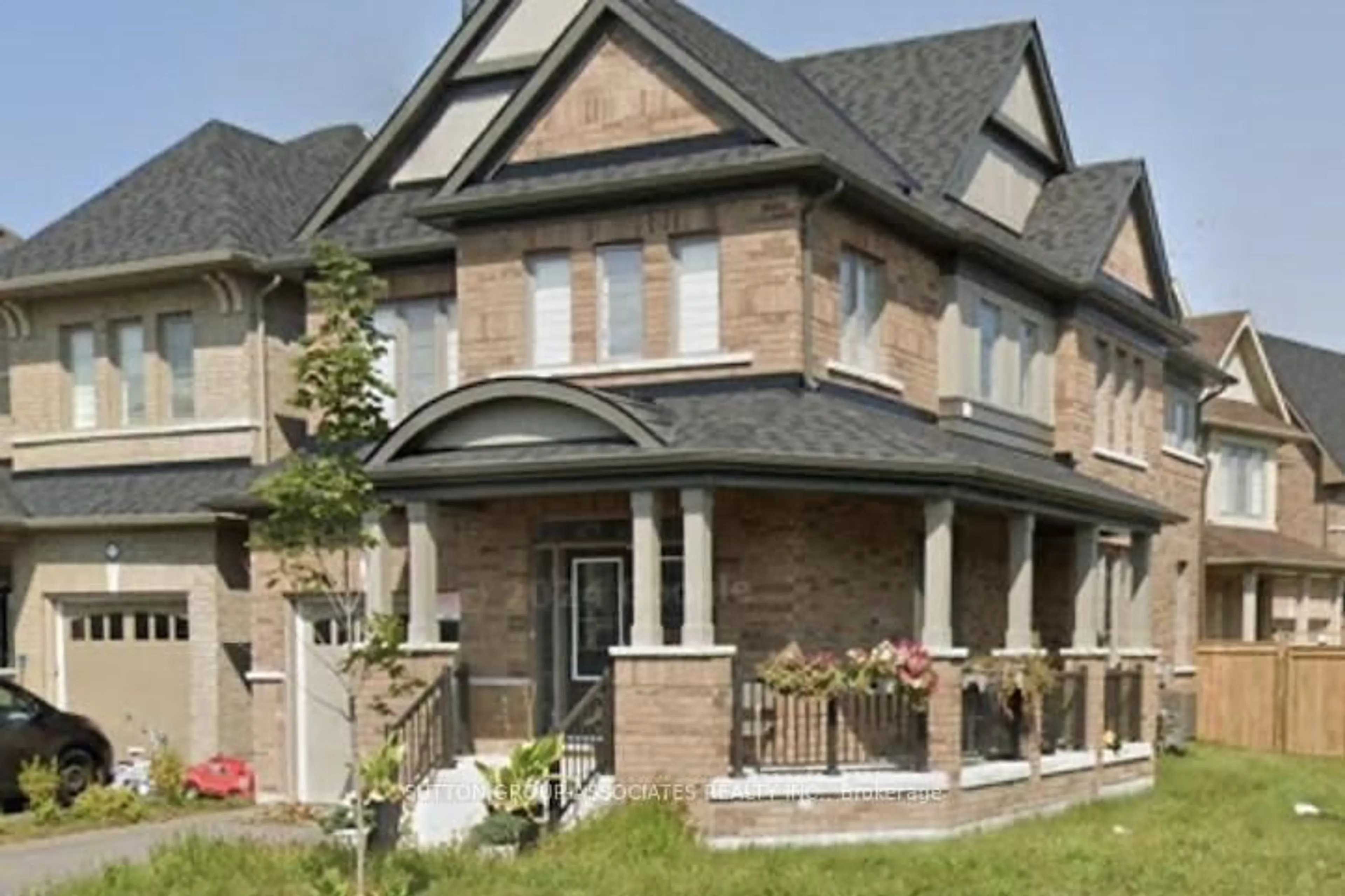 Home with brick exterior material, street for 2576 Orchestrate Dr, Oshawa Ontario L1L 0R4