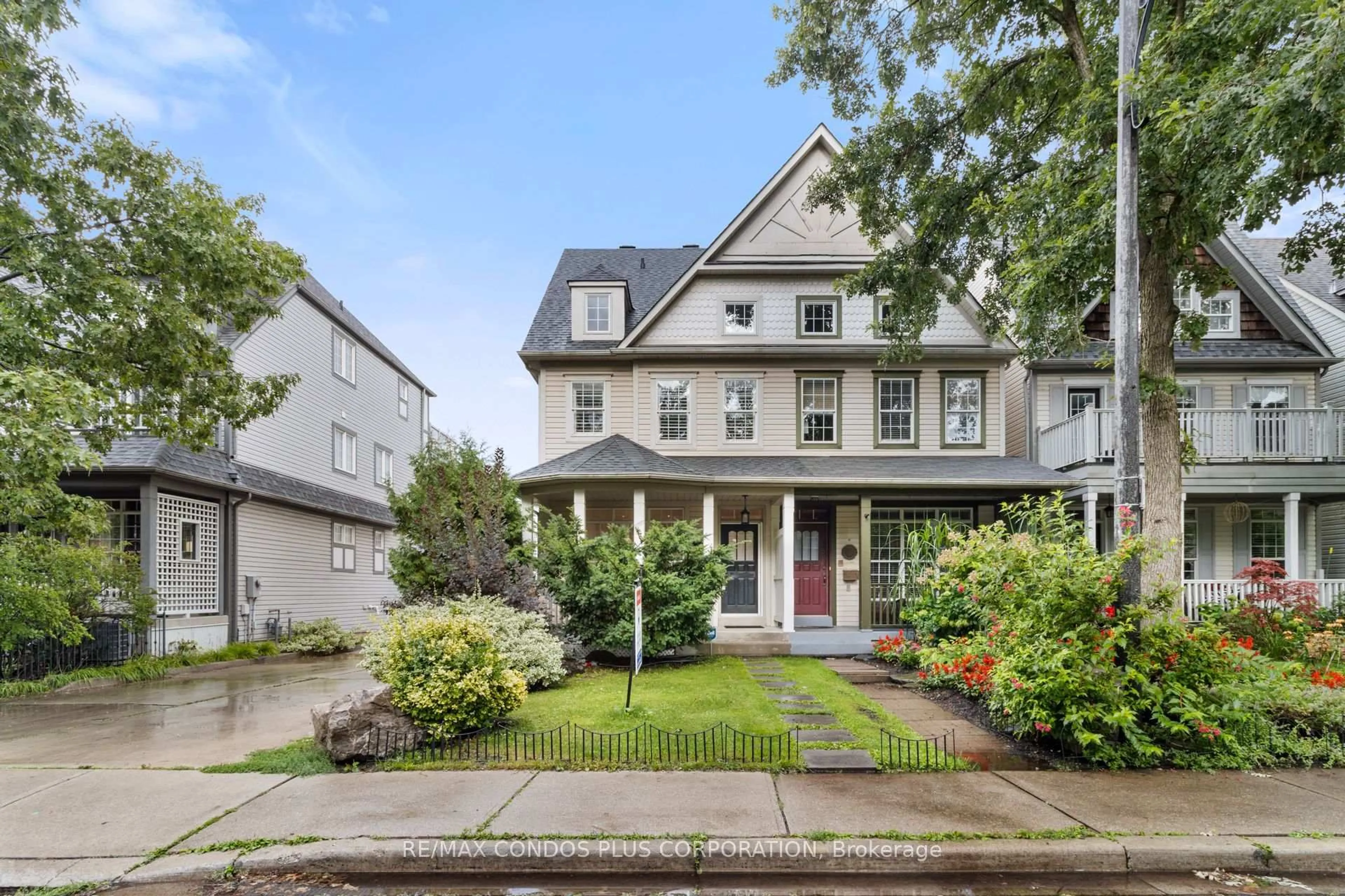 Home with vinyl exterior material, street for 127 Boardwalk Dr, Toronto Ontario M4L 3X9