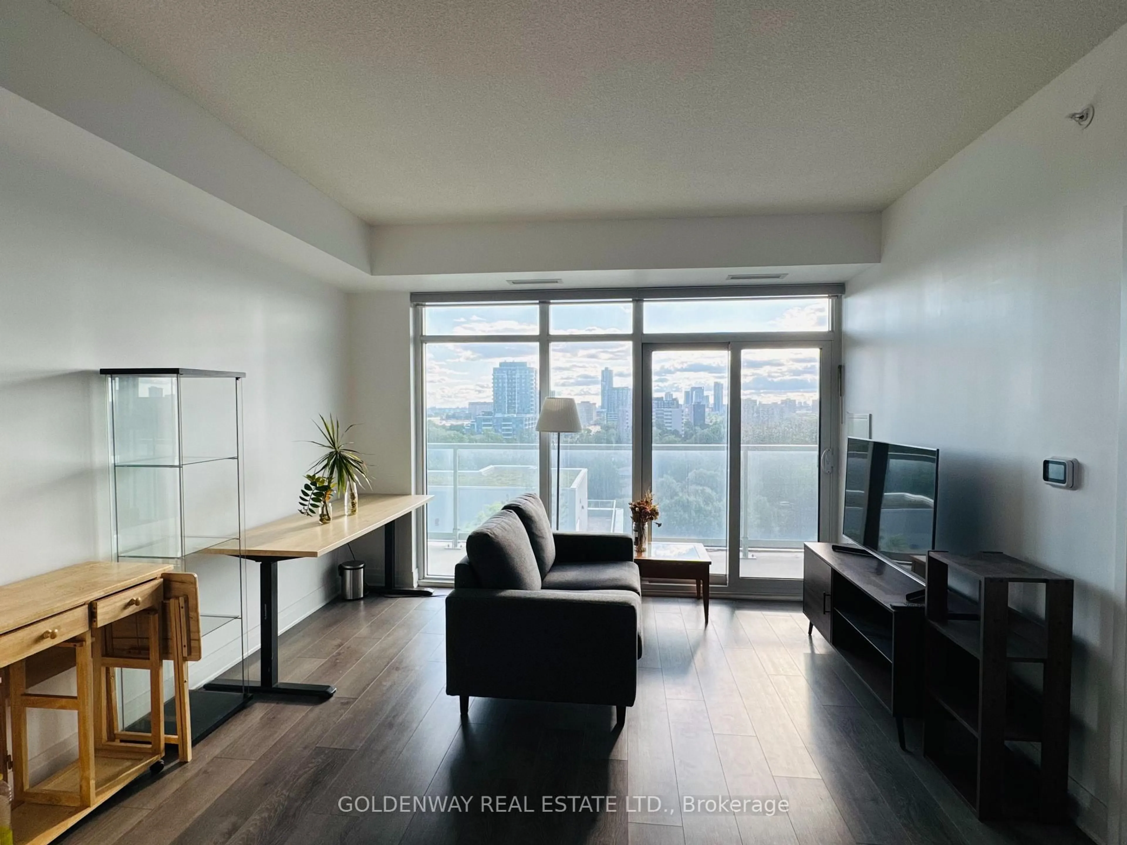 Living room with furniture, wood/laminate floor for 3220 Sheppard Ave #901, Toronto Ontario M1T 3K1