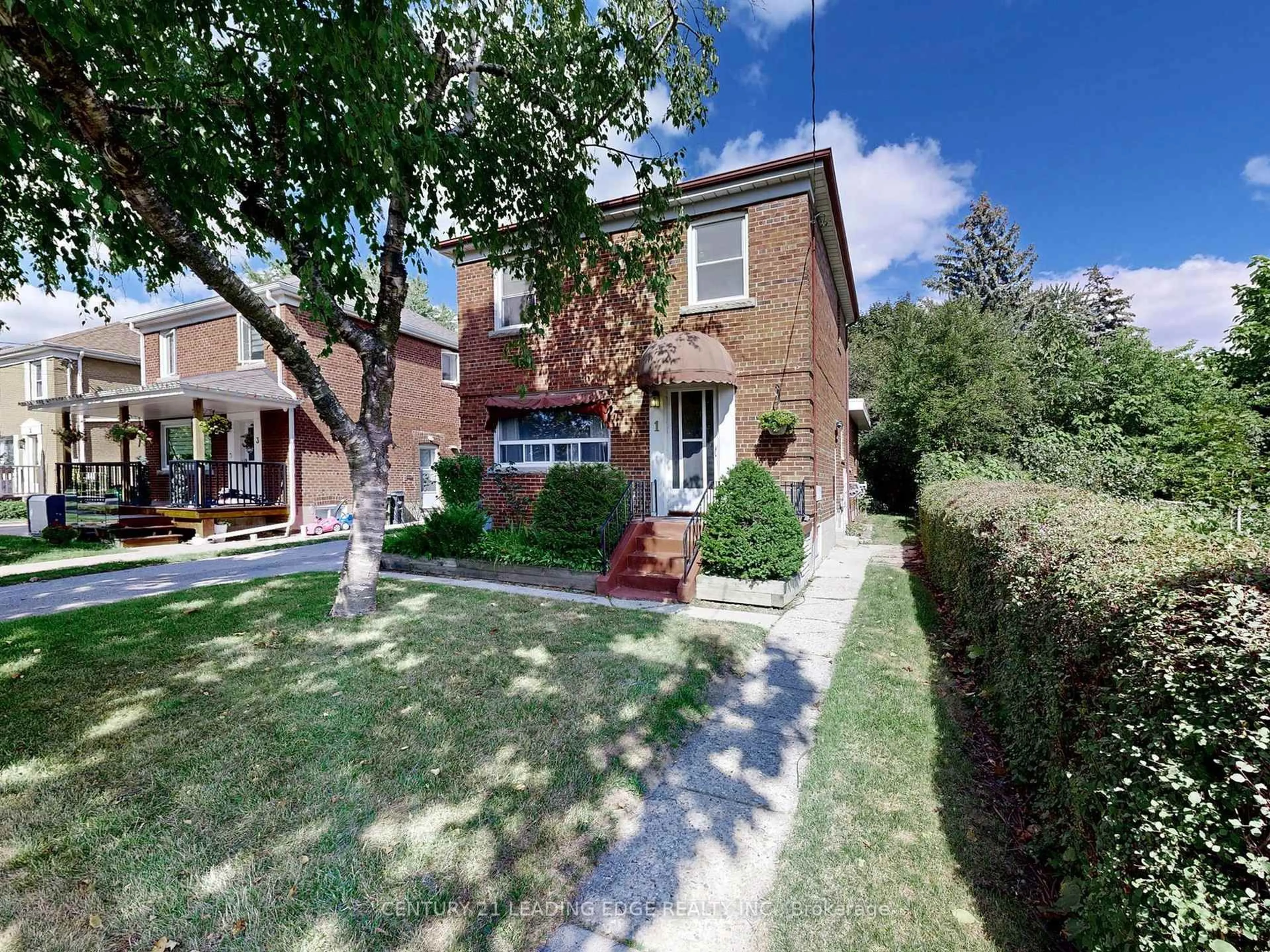 Home with brick exterior material, street for 1 Faulkland Rd, Toronto Ontario M1L 3S2