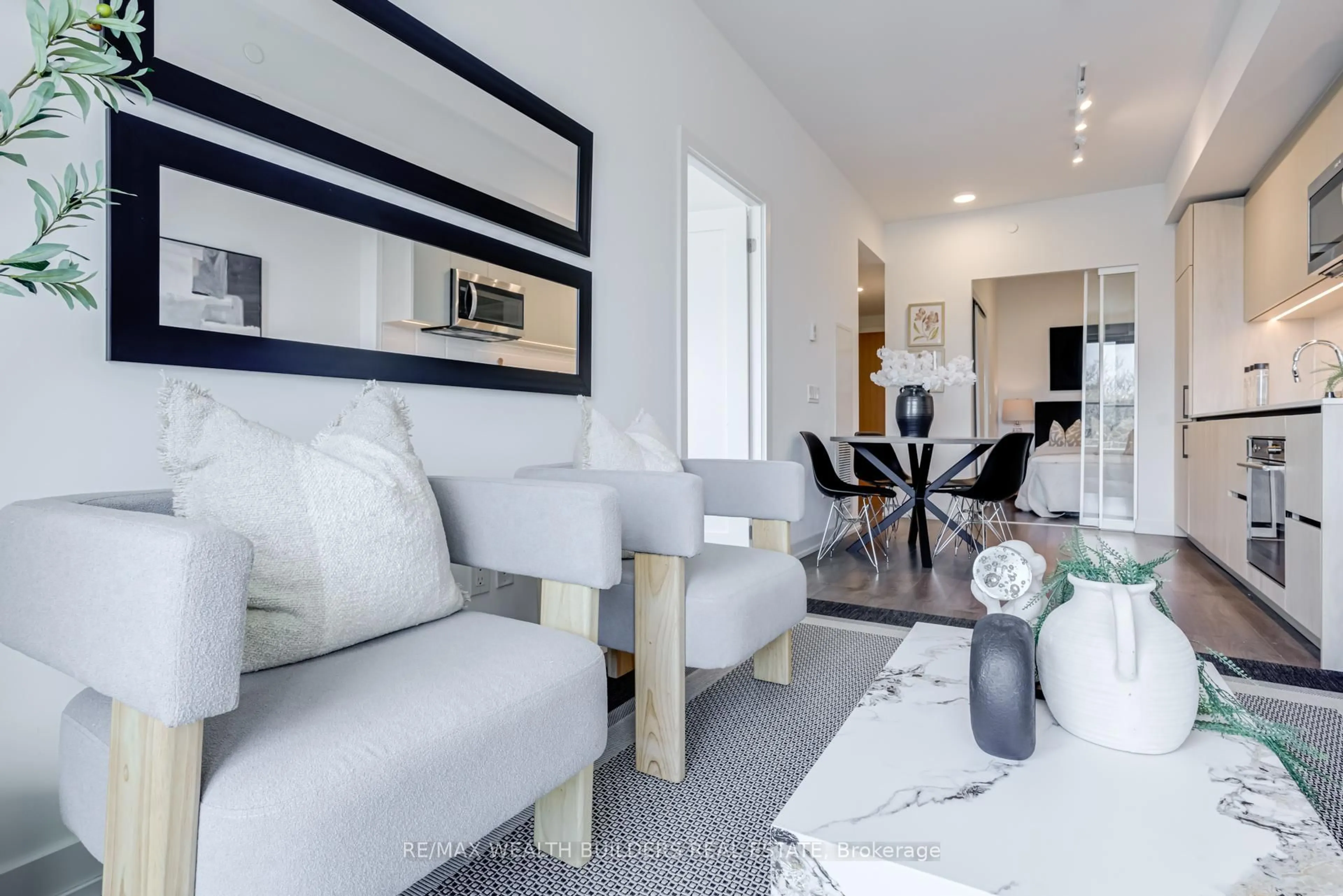 Living room with furniture, unknown for 150 Logan Ave #444, Toronto Ontario M4M 0E4