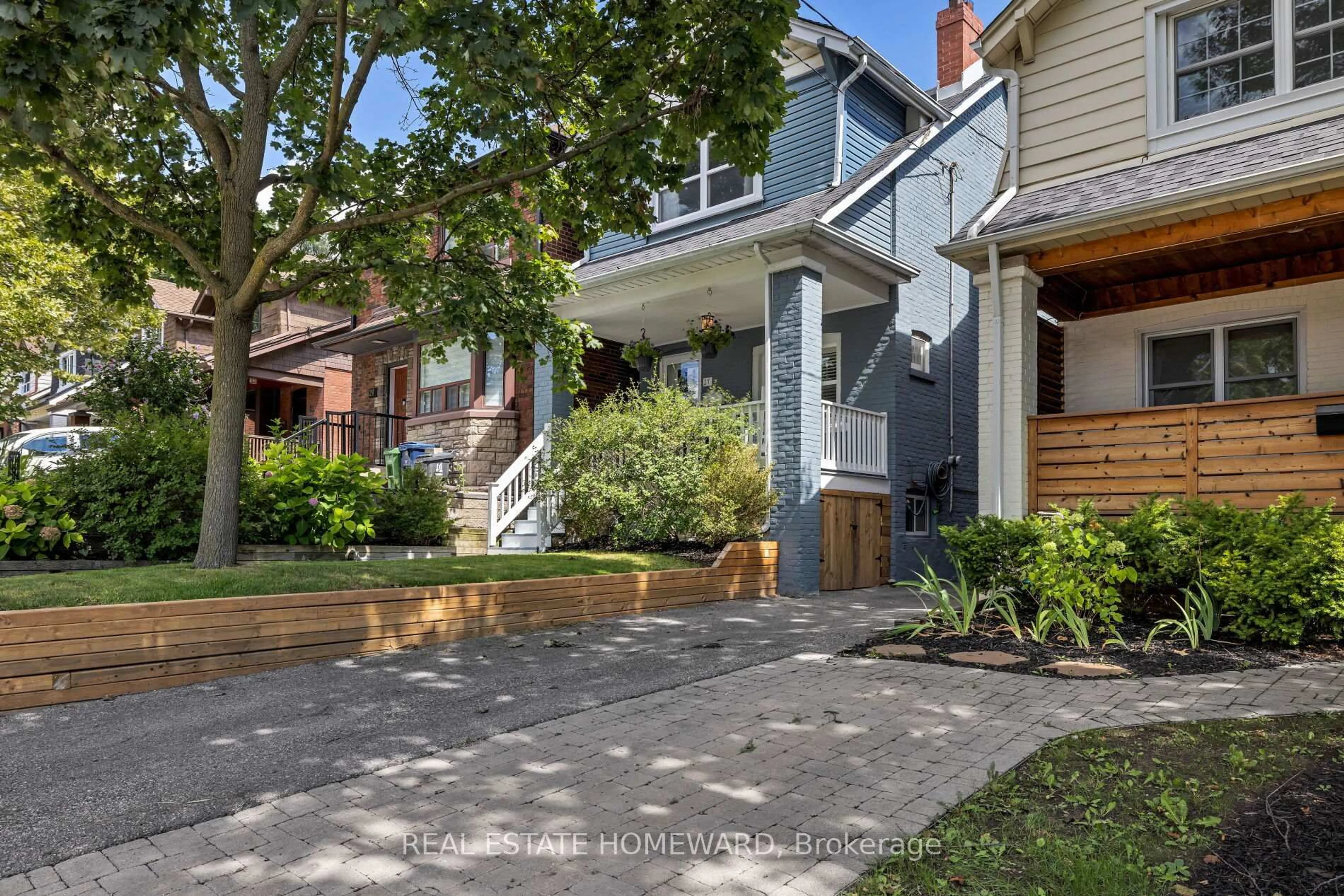 Home with brick exterior material, street for 27 Normandy Blvd, Toronto Ontario M4L 3K1