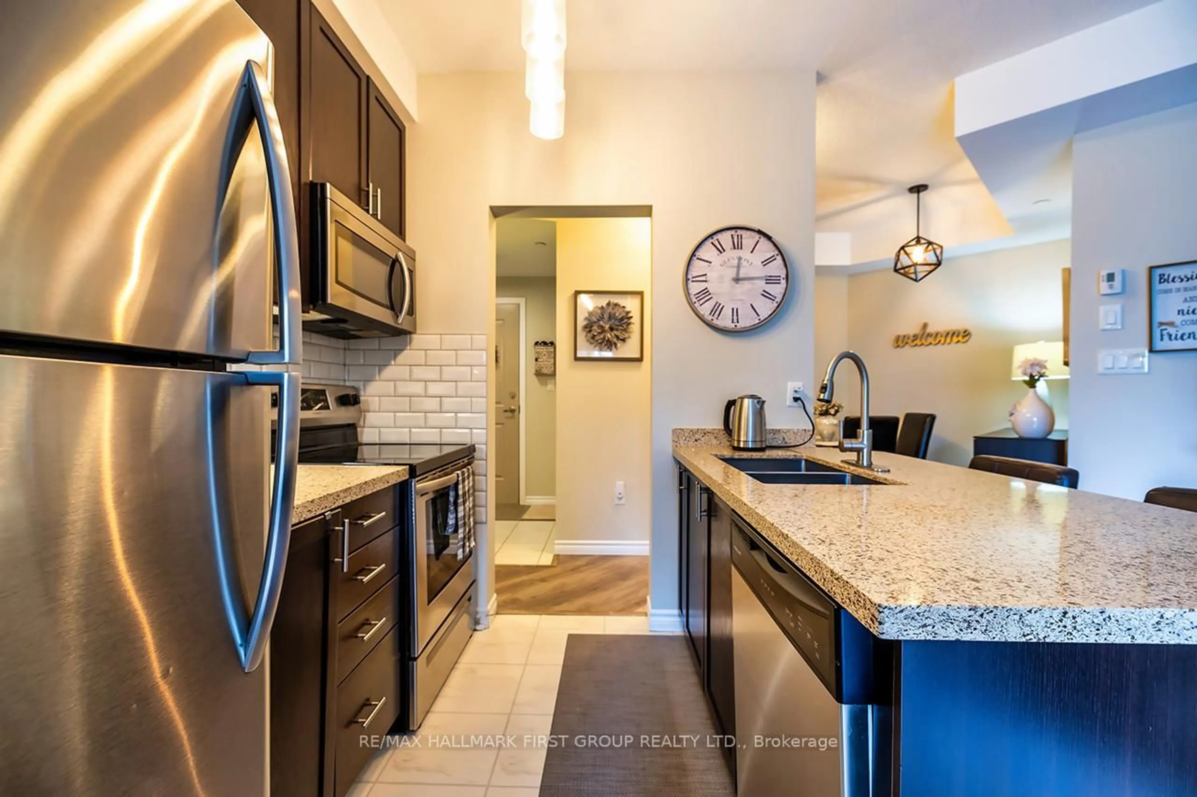 Open concept kitchen, ceramic/tile floor for 84 Aspen Springs Dr #306, Clarington Ontario L1C 0V3