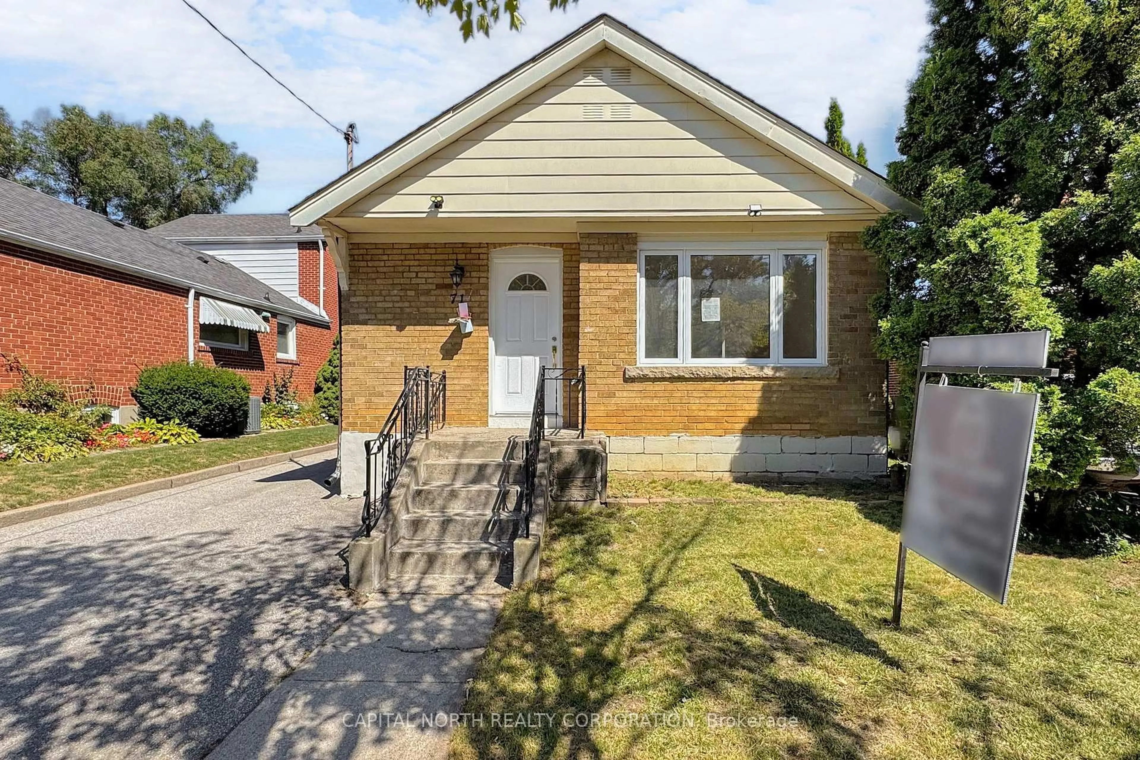 Home with brick exterior material, street for 71 Bertha Ave, Toronto Ontario M1L 3M3
