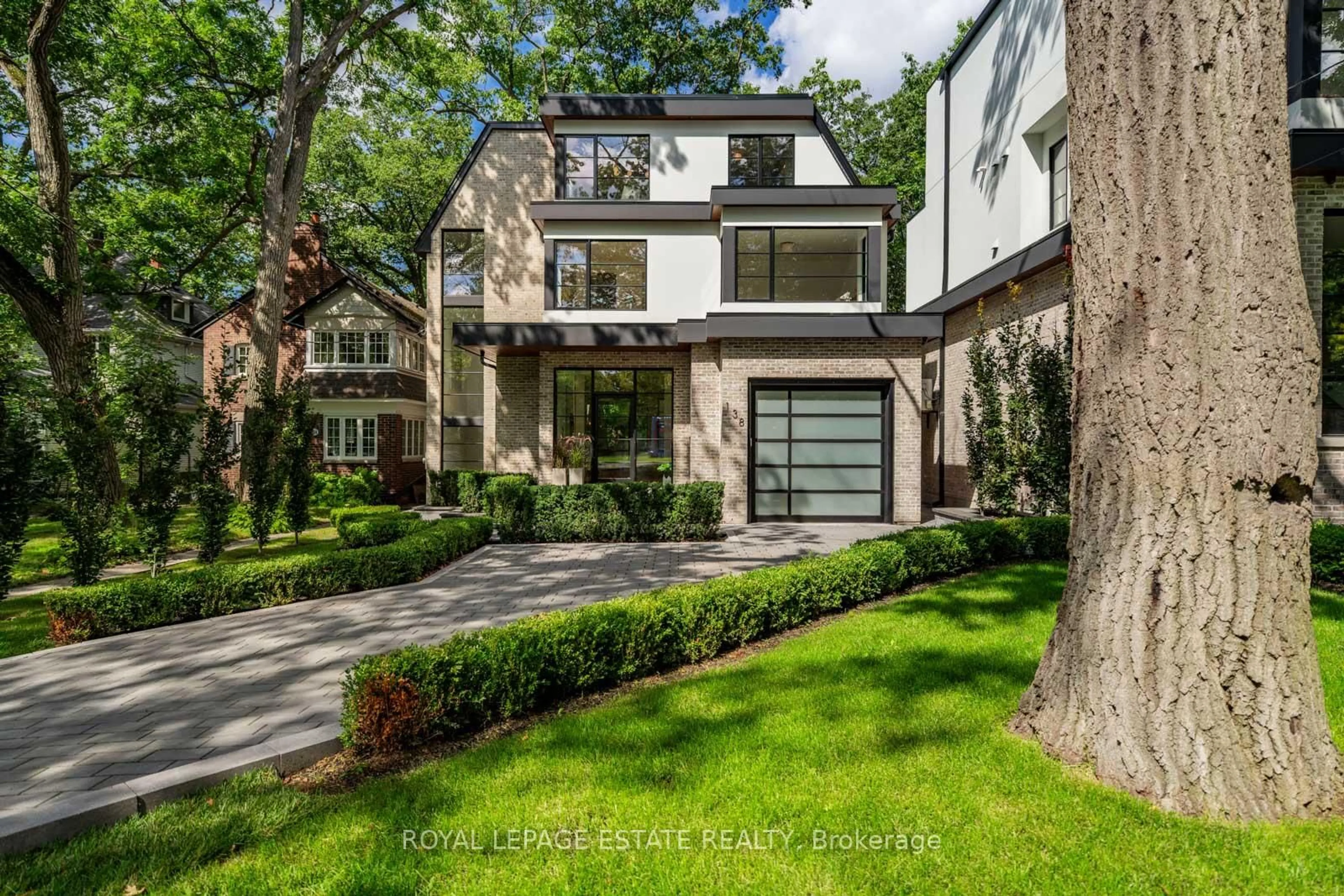 Home with brick exterior material, street for 138 Balsam Ave, Toronto Ontario M4E 3C1