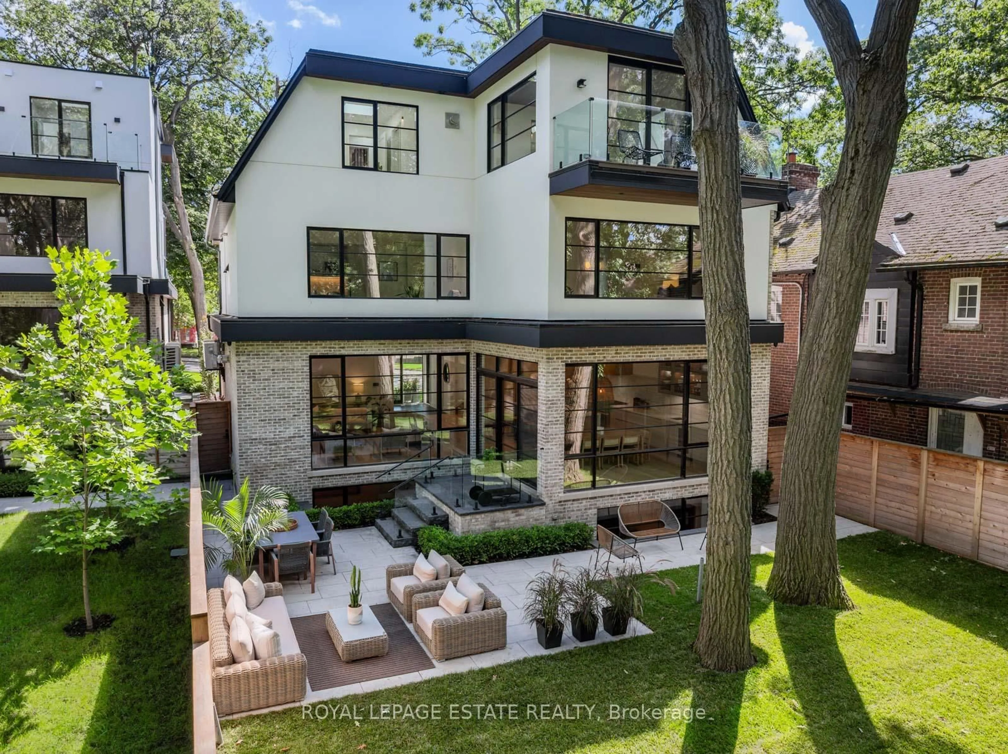 Home with brick exterior material, street for 138 Balsam Ave, Toronto Ontario M4E 3C1