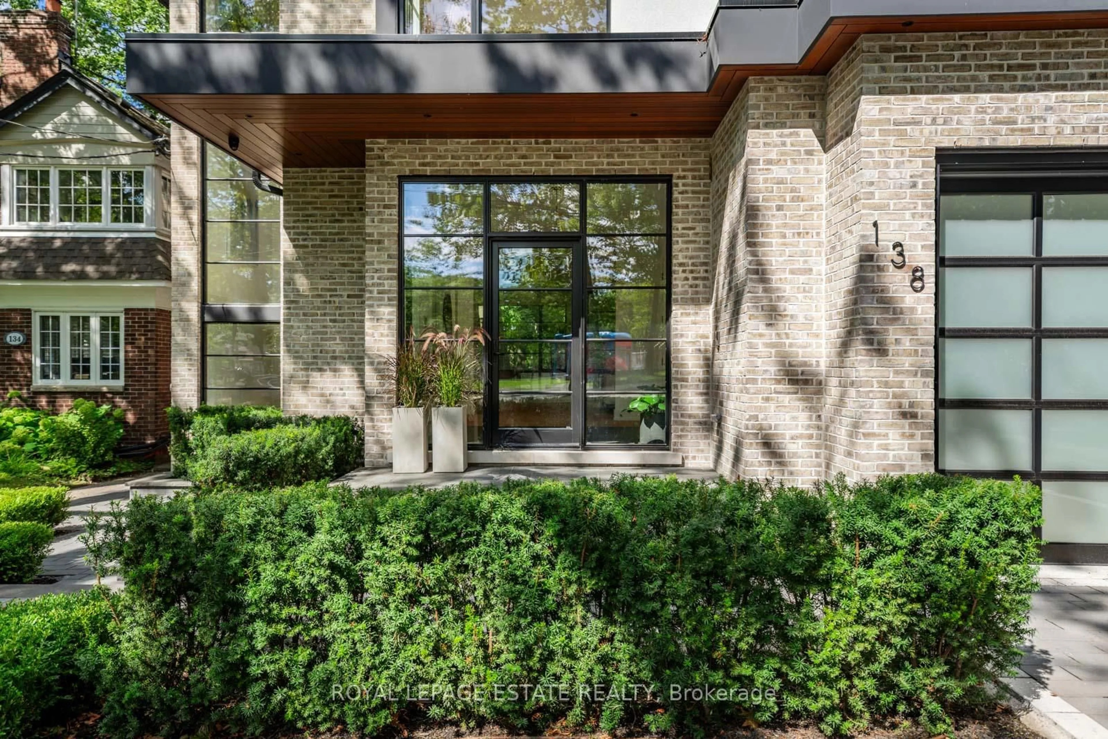 Home with brick exterior material, street for 138 Balsam Ave, Toronto Ontario M4E 3C1