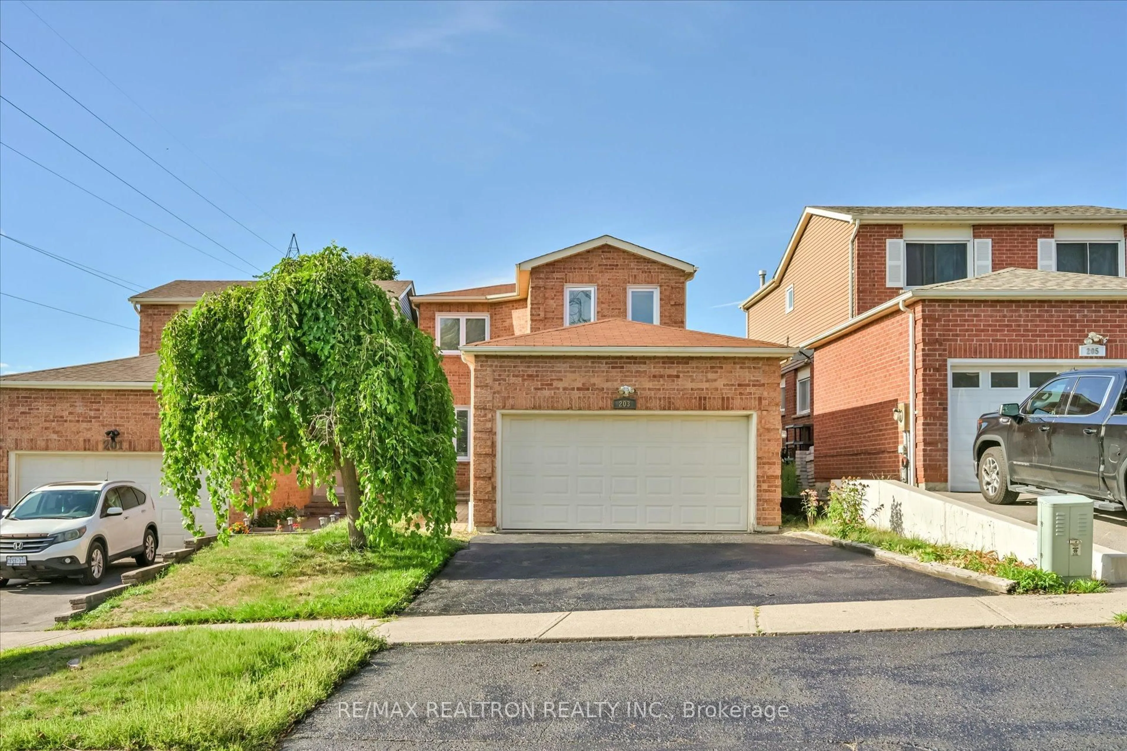 Home with brick exterior material, street for 203 Glen Hill Dr, Whitby Ontario L1N 7J5