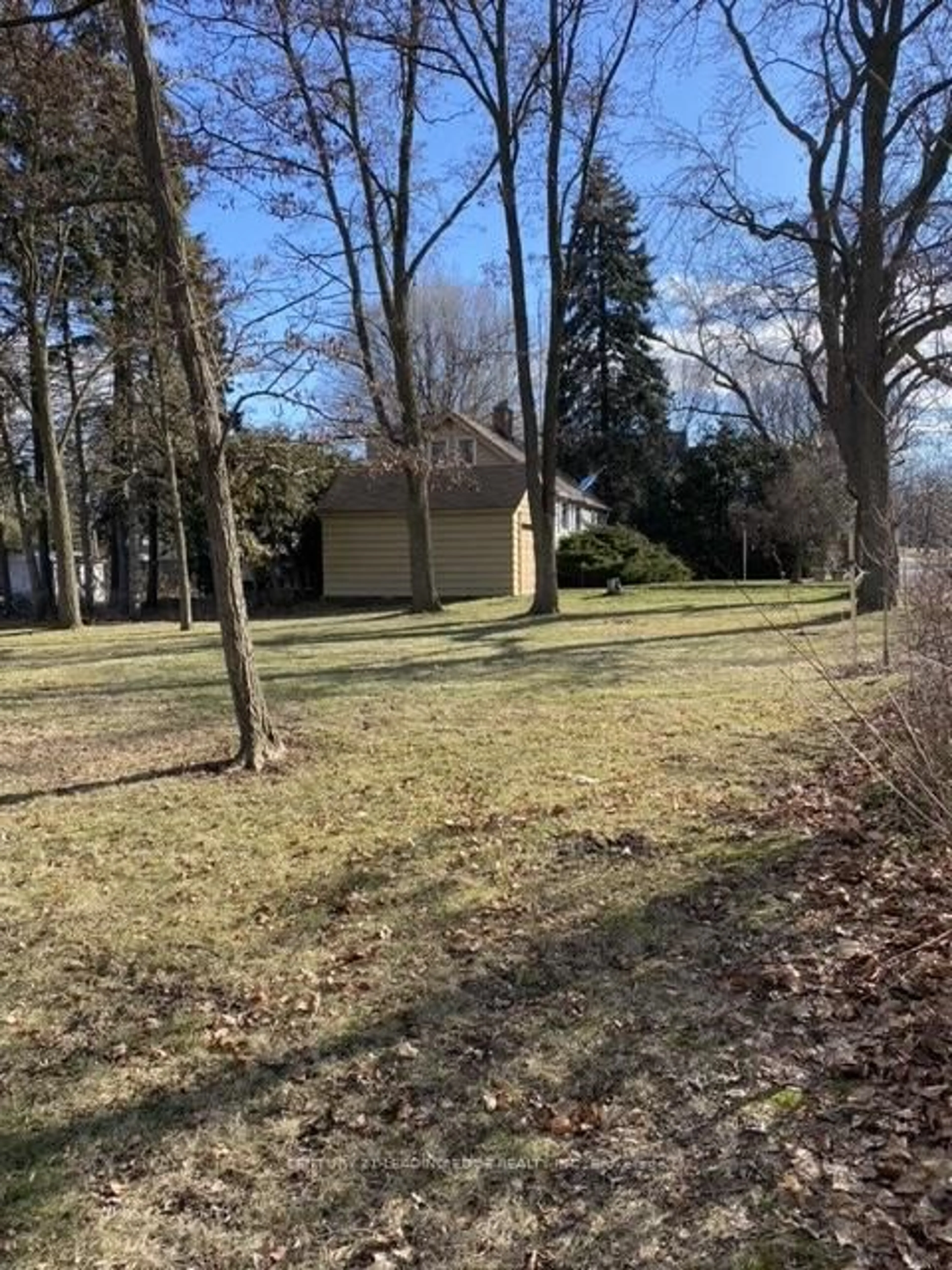 A pic from outside/outdoor area/front of a property/back of a property/a pic from drone, forest/trees view for 21 Faircroft Blvd, Toronto Ontario M1M 2W9