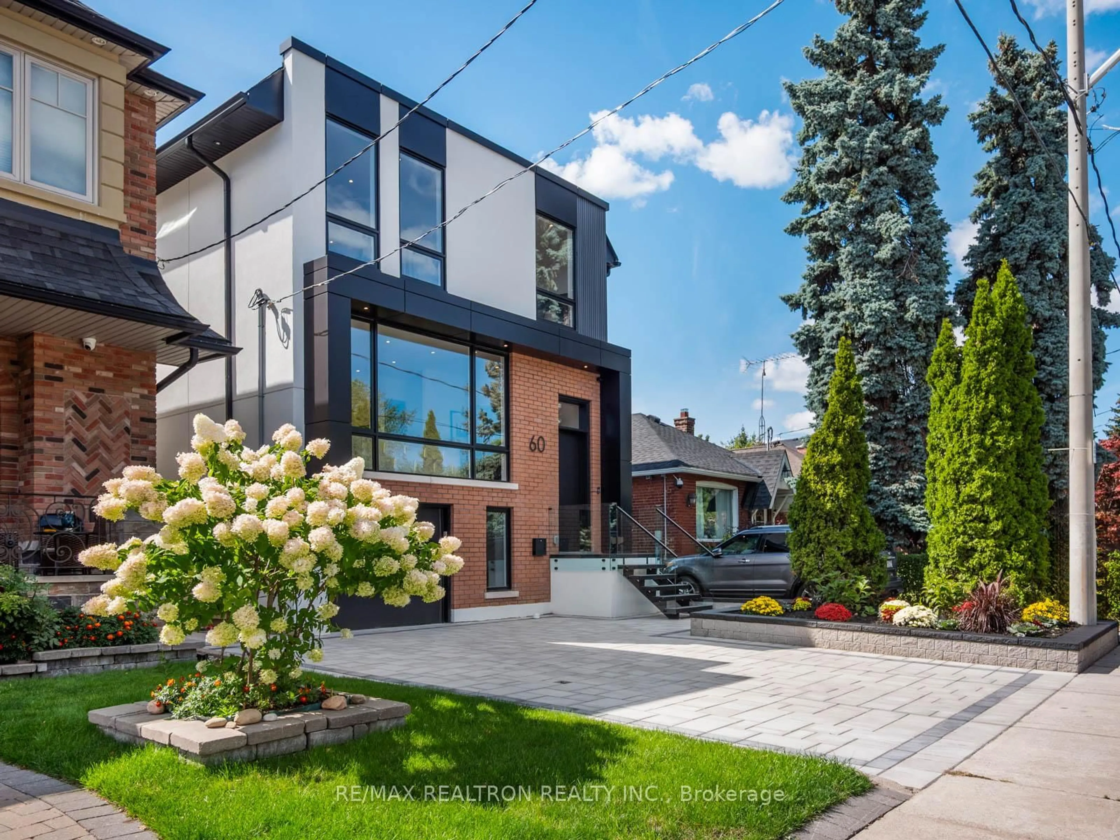 Home with brick exterior material, street for 60 ST HUBERT Ave, Toronto Ontario M4J 3Z3