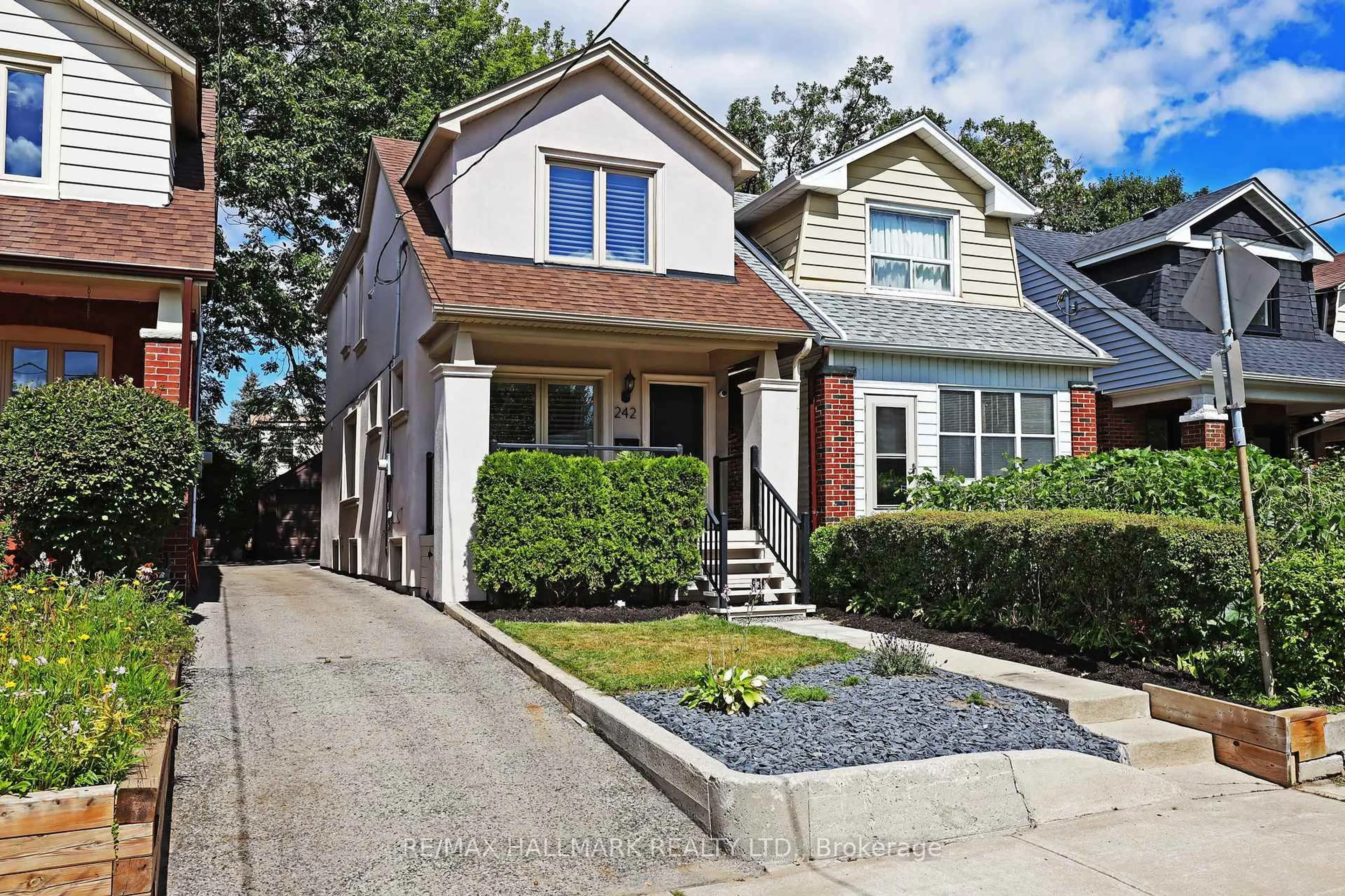 Home with brick exterior material, street for 242 Springdale Blvd, Toronto Ontario M4C 1Z9