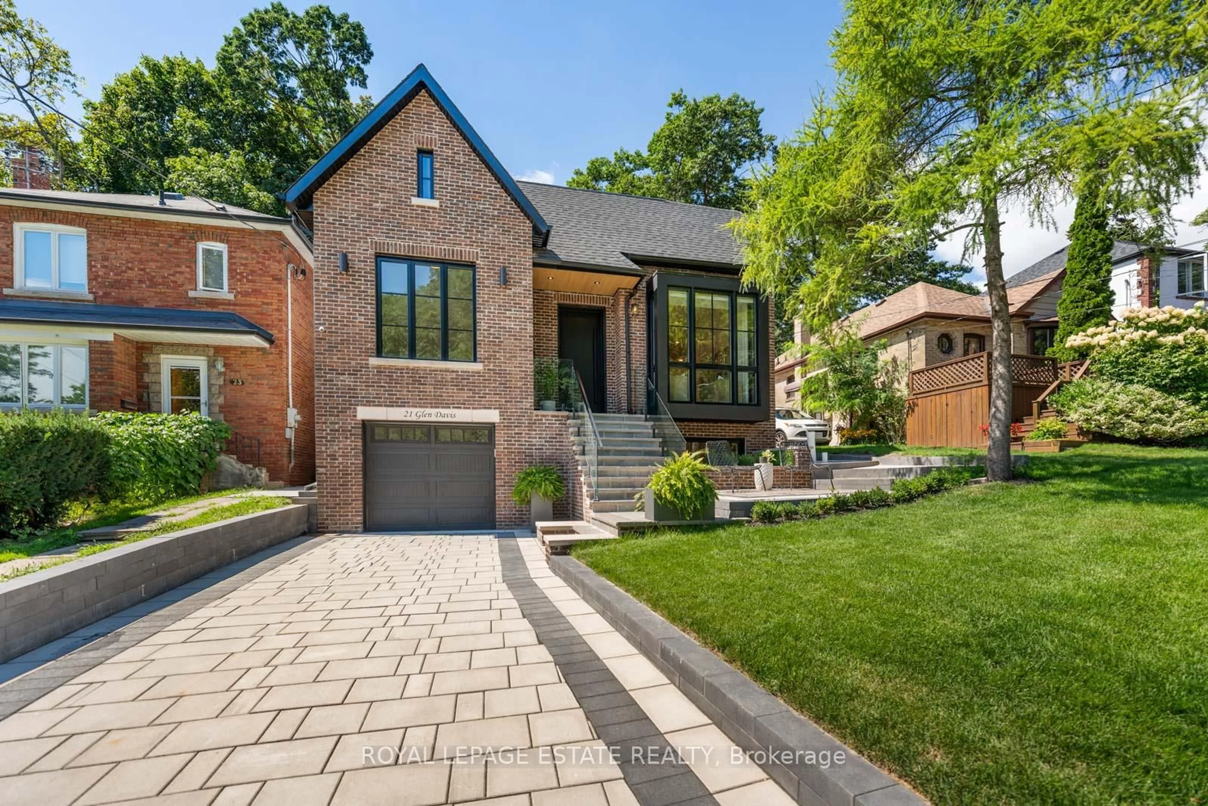 Home with brick exterior material, street for 21 Glen Davis Cres, Toronto Ontario M4E 1X6
