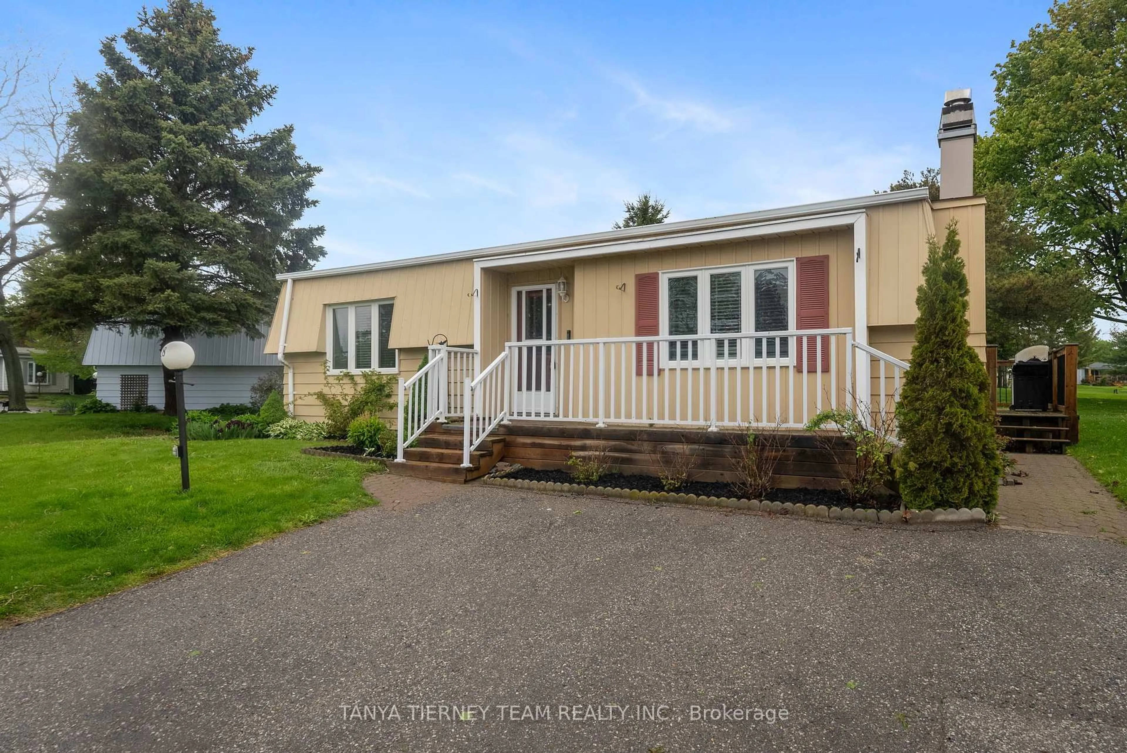 Home with vinyl exterior material, street for 18 The Cove Rd, Clarington Ontario L1B 1B9