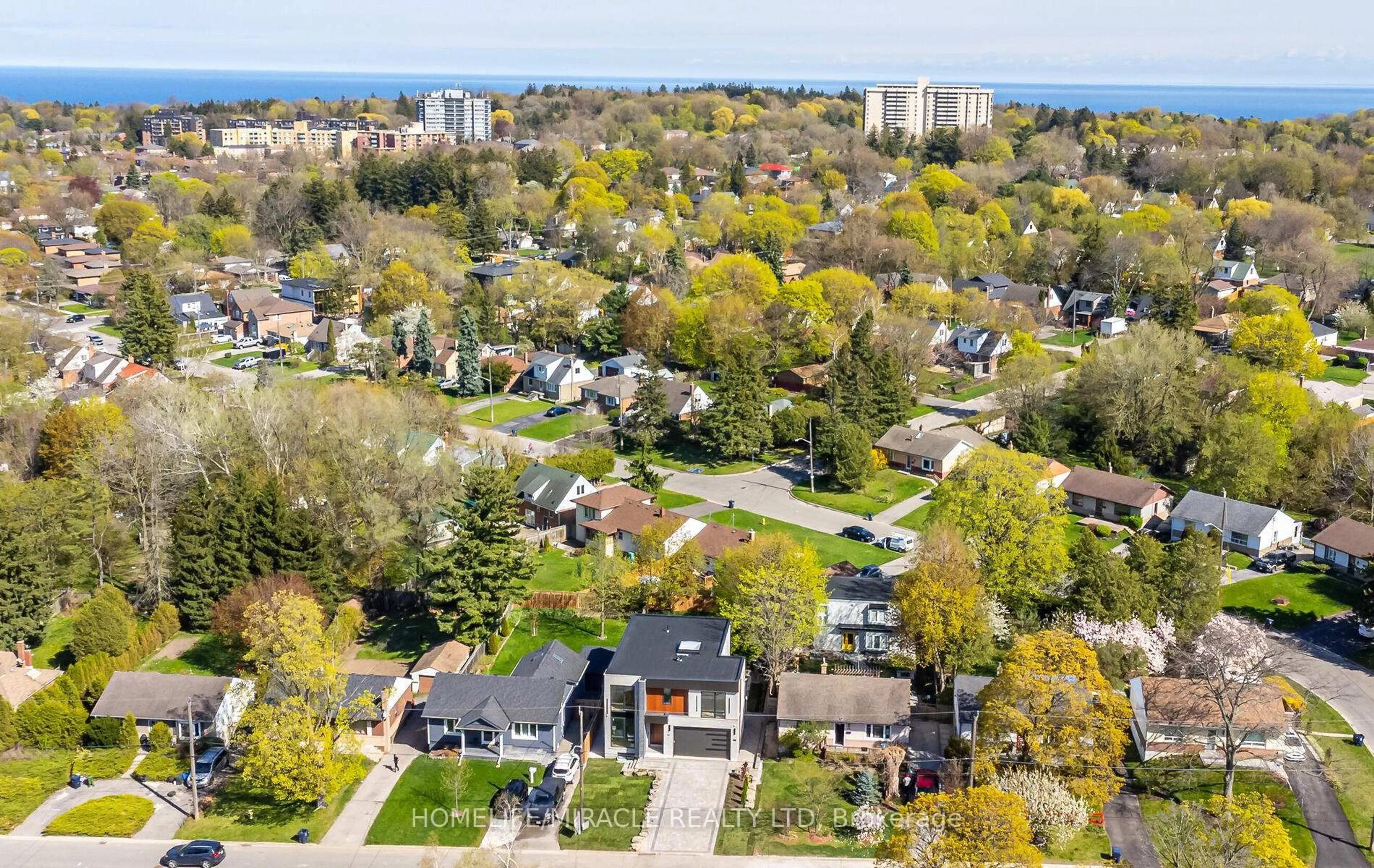 A pic from outside/outdoor area/front of a property/back of a property/a pic from drone, street for 55 Adanac Dr, Toronto Ontario M1M 2E6