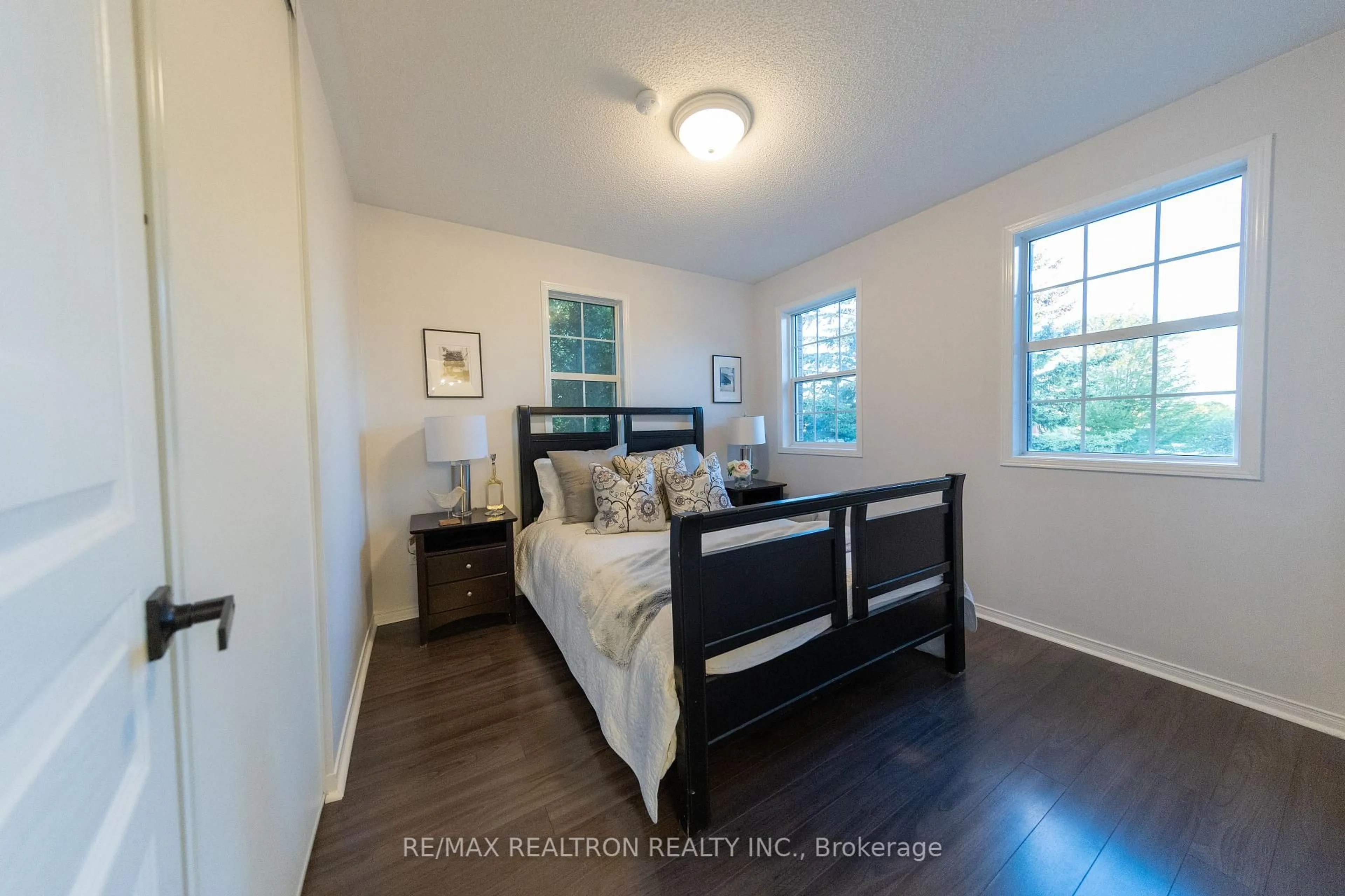 Bedroom with bed, wood/laminate floor for 2 Randolph Ave, Whitby Ontario L1P 1N2