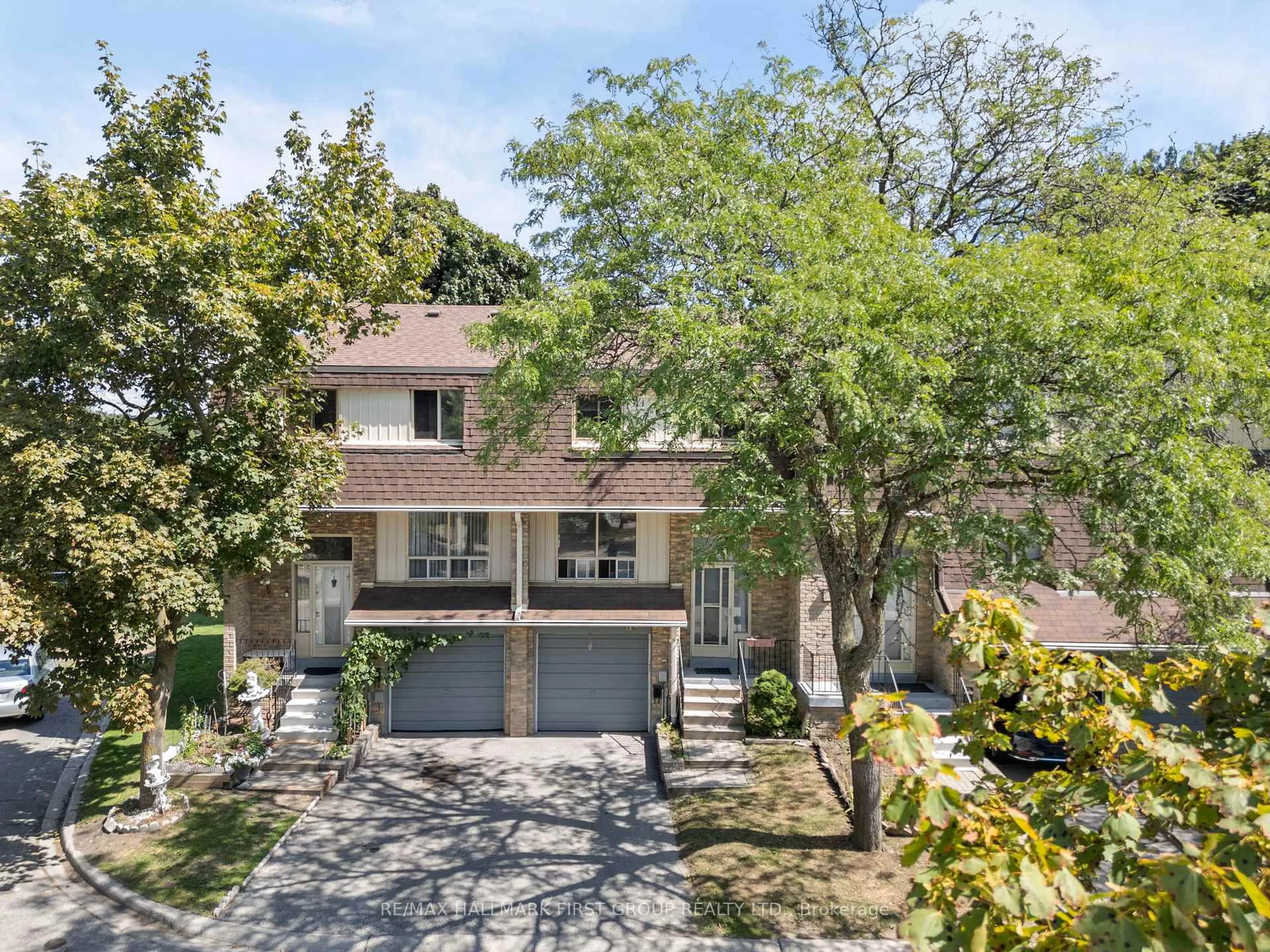 A pic from outside/outdoor area/front of a property/back of a property/a pic from drone, street for 371 Orton Park Rd #38, Toronto Ontario M1G 3V1
