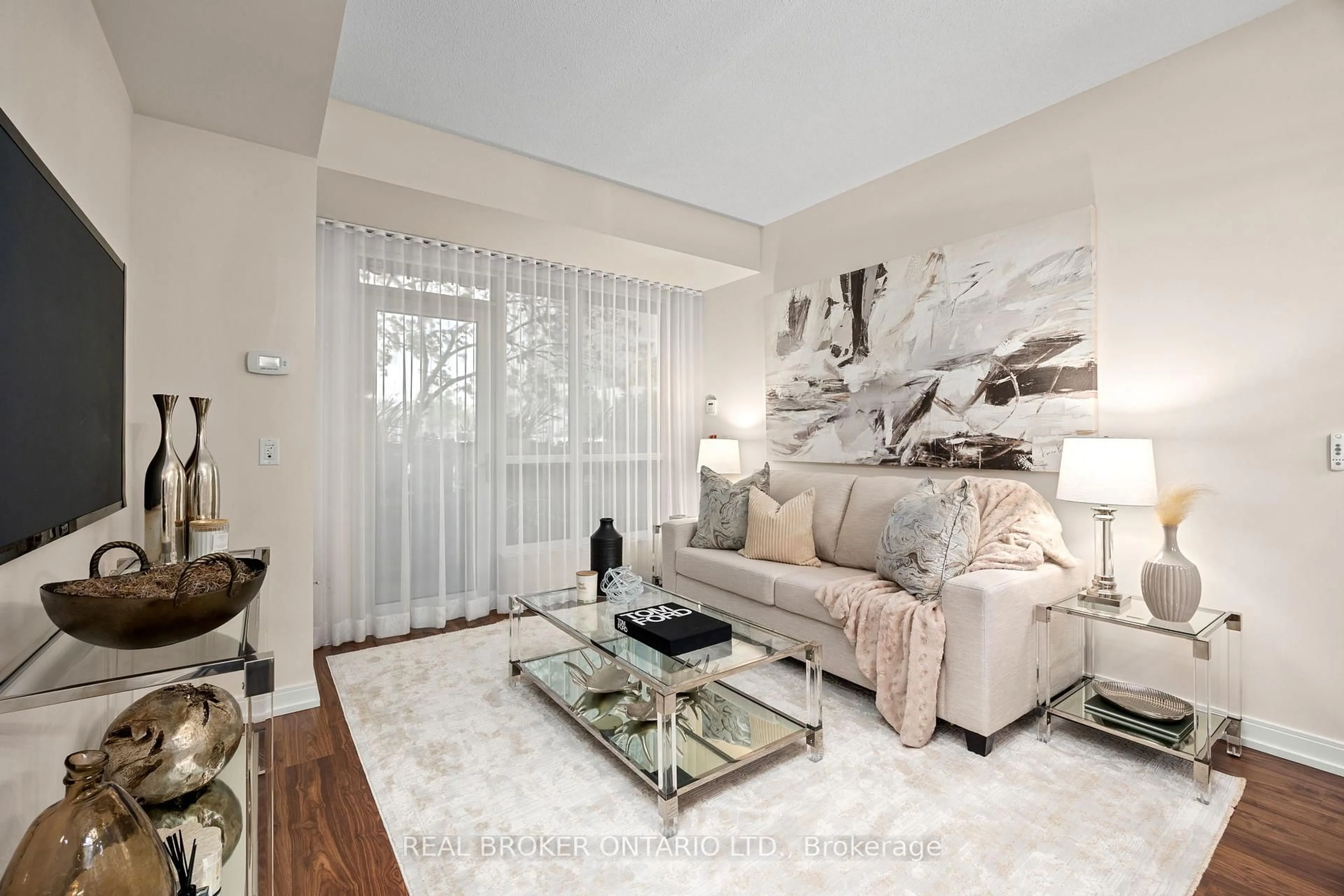 Living room with furniture, unknown for 181 Village Green Sq #119, Toronto Ontario M1S 0K6