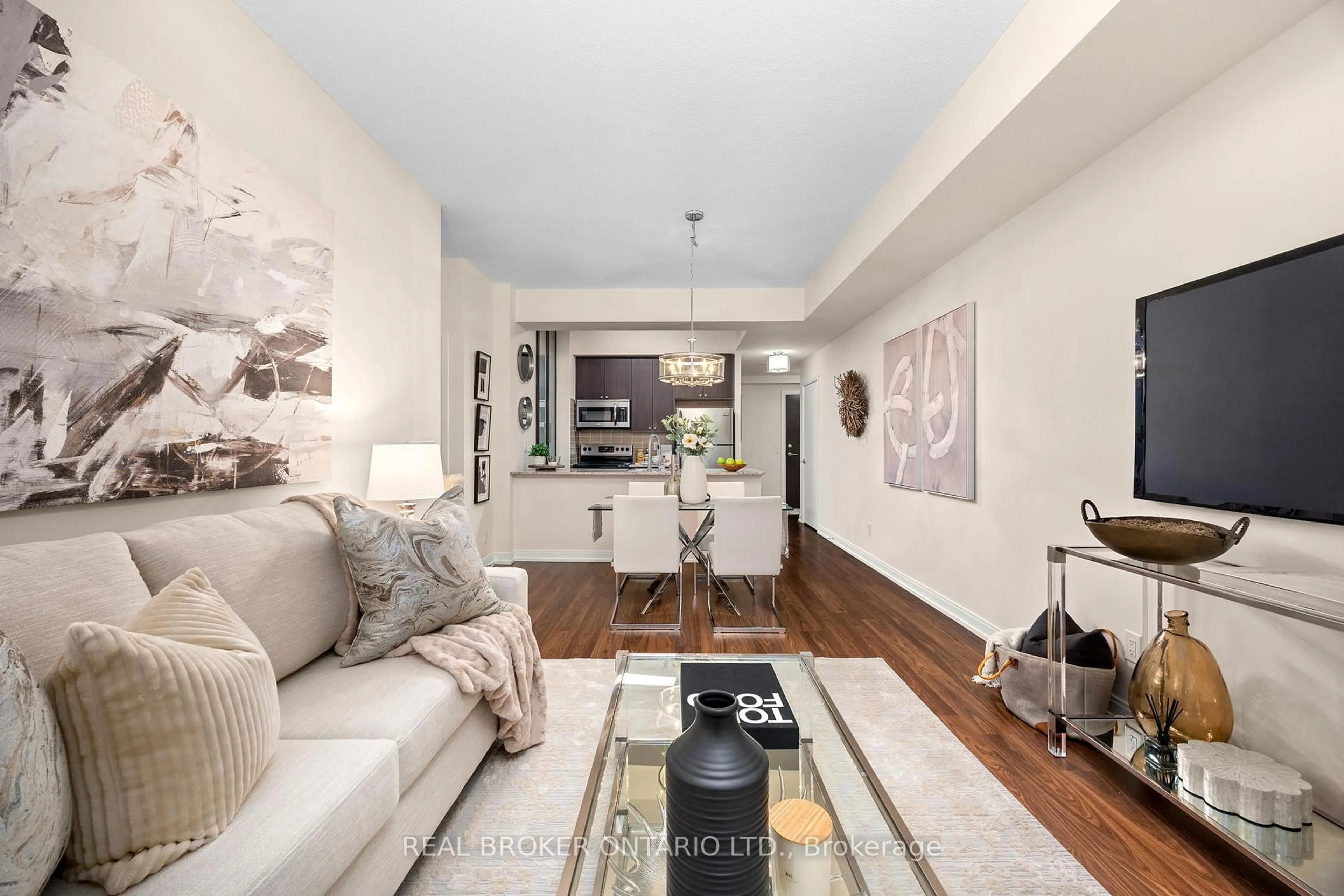 Living room with furniture, unknown for 181 Village Green Sq #119, Toronto Ontario M1S 0K6