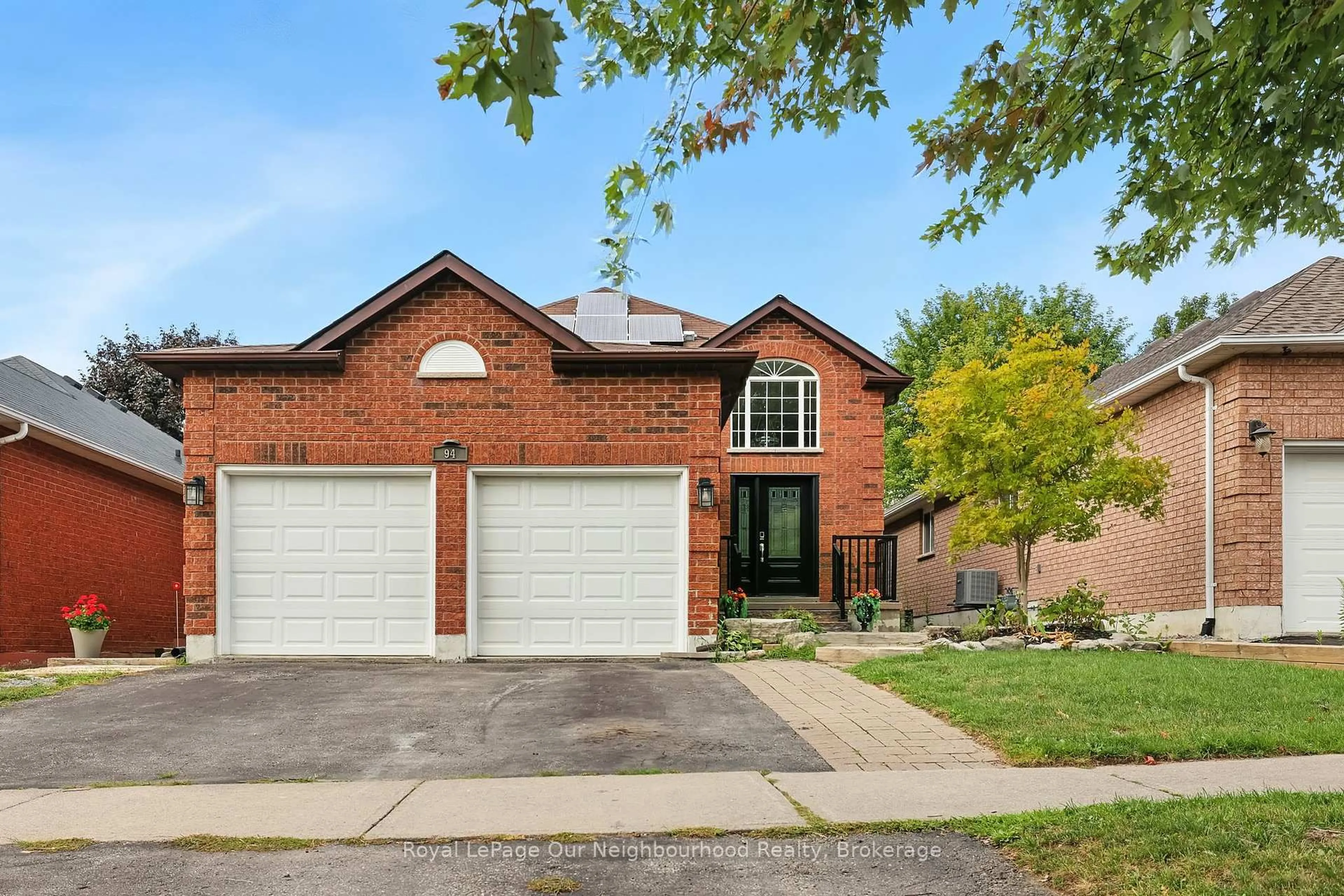 Home with brick exterior material, street for 94 West Side Dr, Clarington Ontario L1C 4Y9