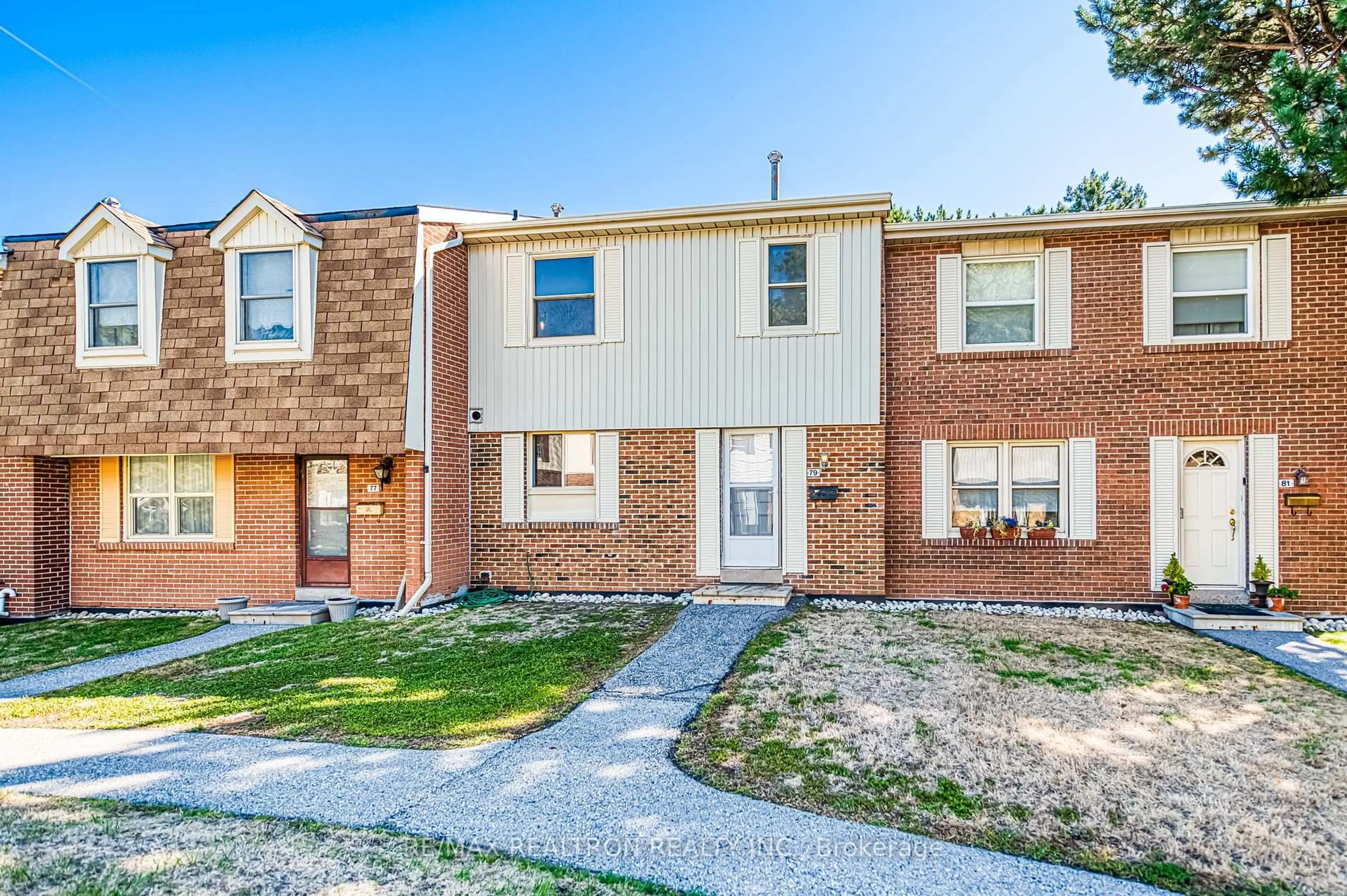 Home with brick exterior material, street for 91 L'Amoreaux Dr #79, Toronto Ontario M1W 2J8