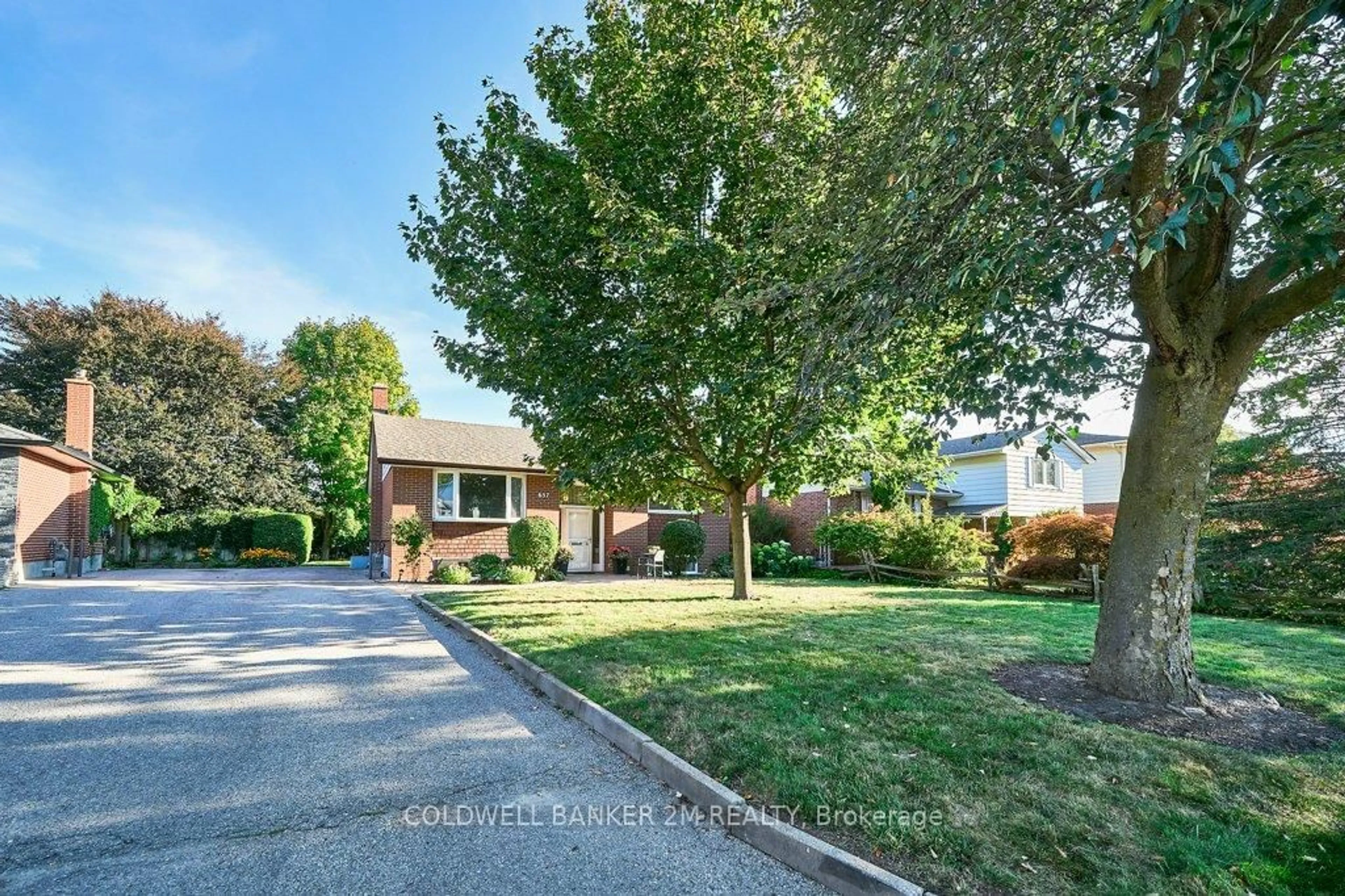Home with brick exterior material, street for 657 Balmoral Dr, Oshawa Ontario L1J 3A6
