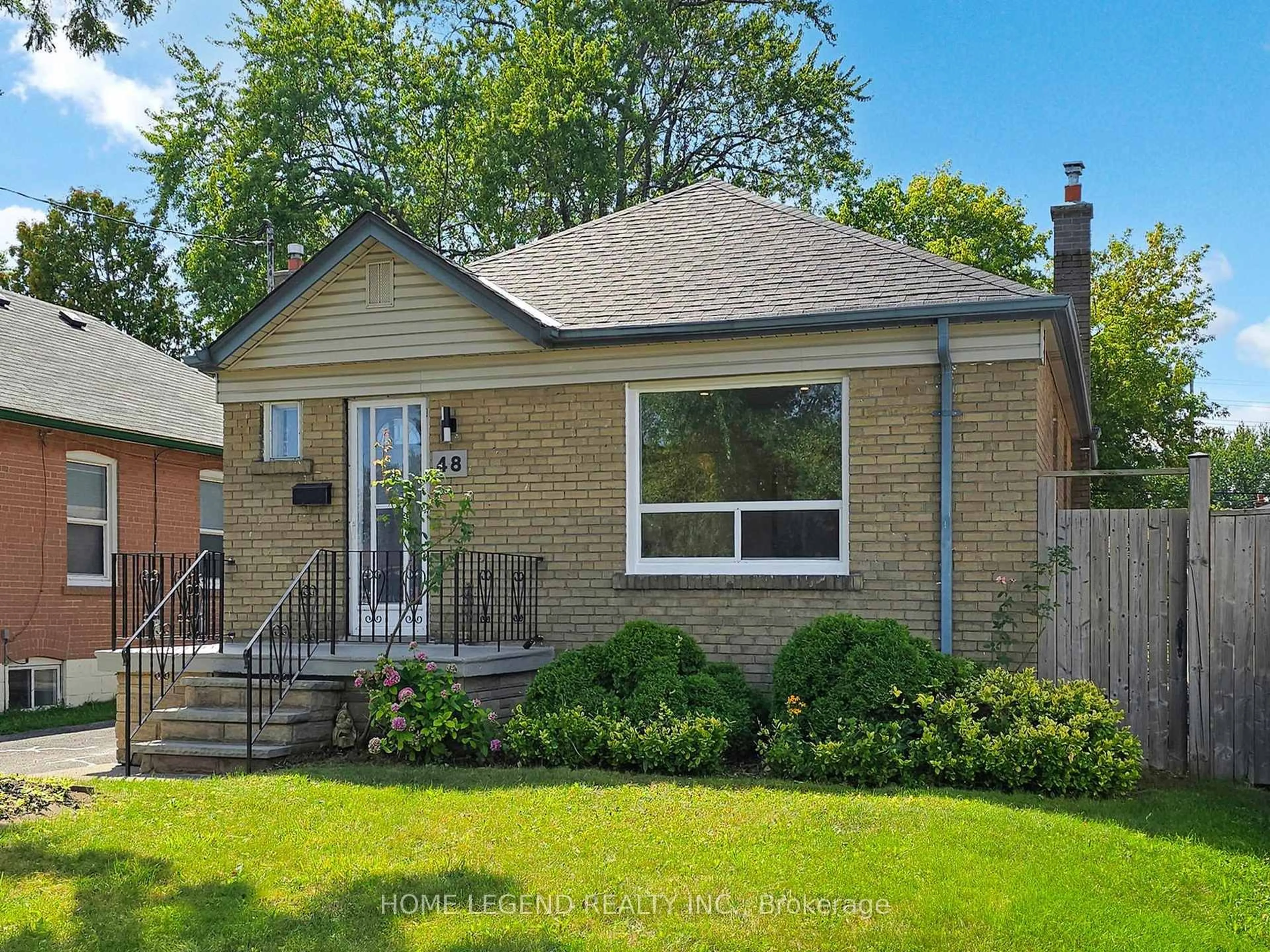 Home with brick exterior material, street for 48 Ainsdale Rd, Toronto Ontario M1R 3Z2