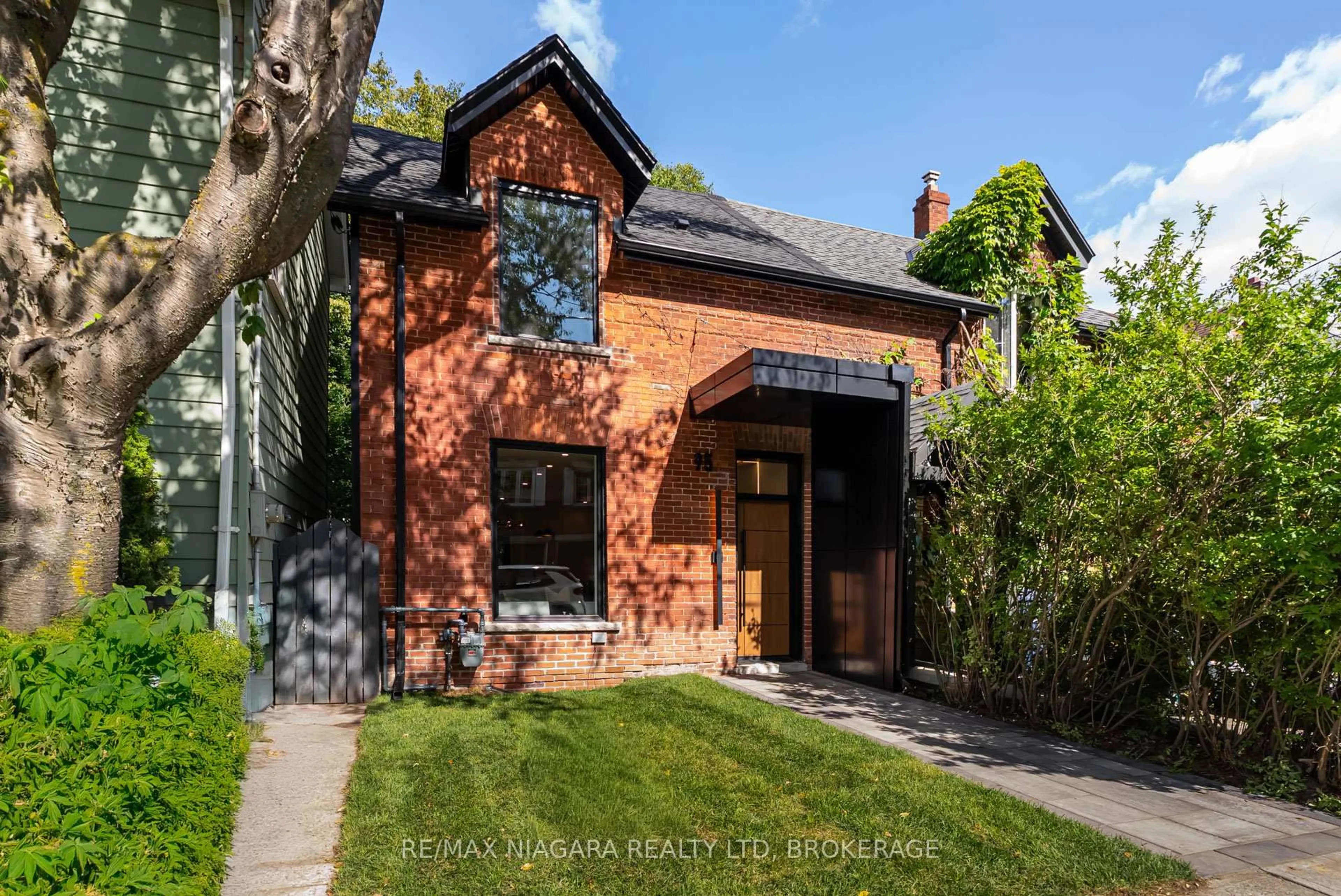 Home with brick exterior material, street for 95 Kimberley Ave, Toronto Ontario M4E 2Z4