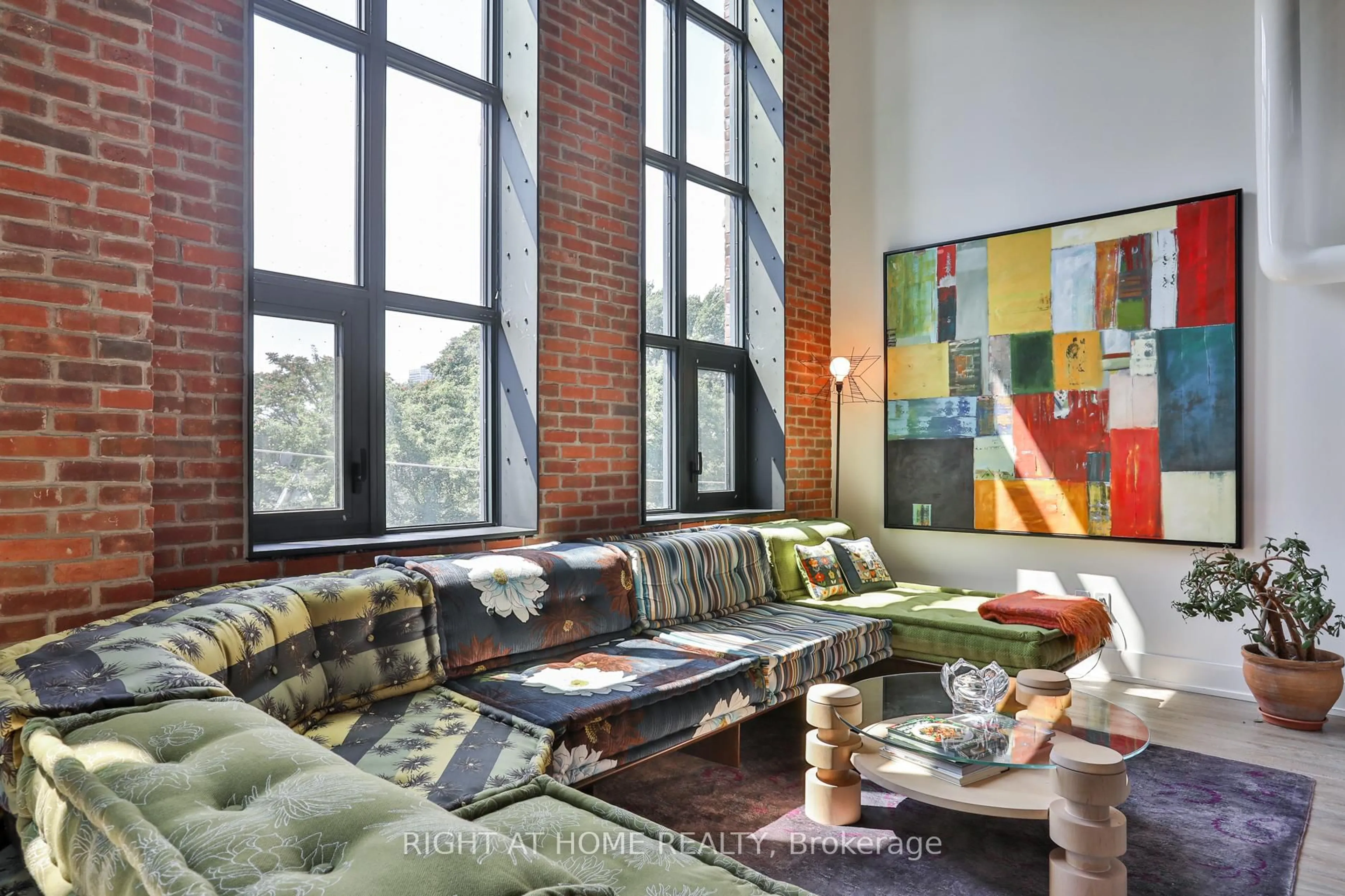 Living room with furniture, unknown for 150 Logan Ave #409, Toronto Ontario M4M 0E4