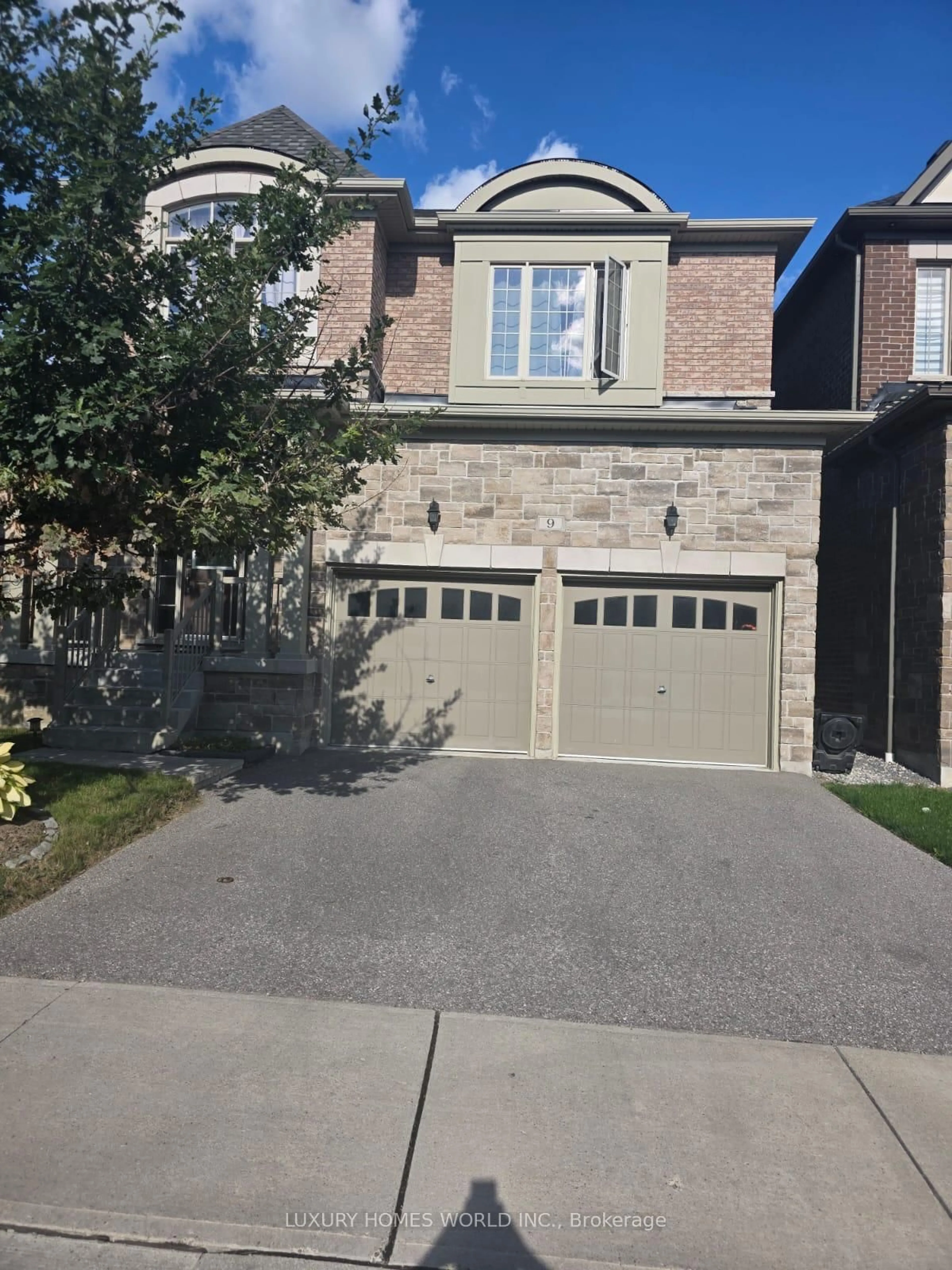 Home with brick exterior material, street for 9 Coates Of Arms Lane, Ajax Ontario L1T 3S2