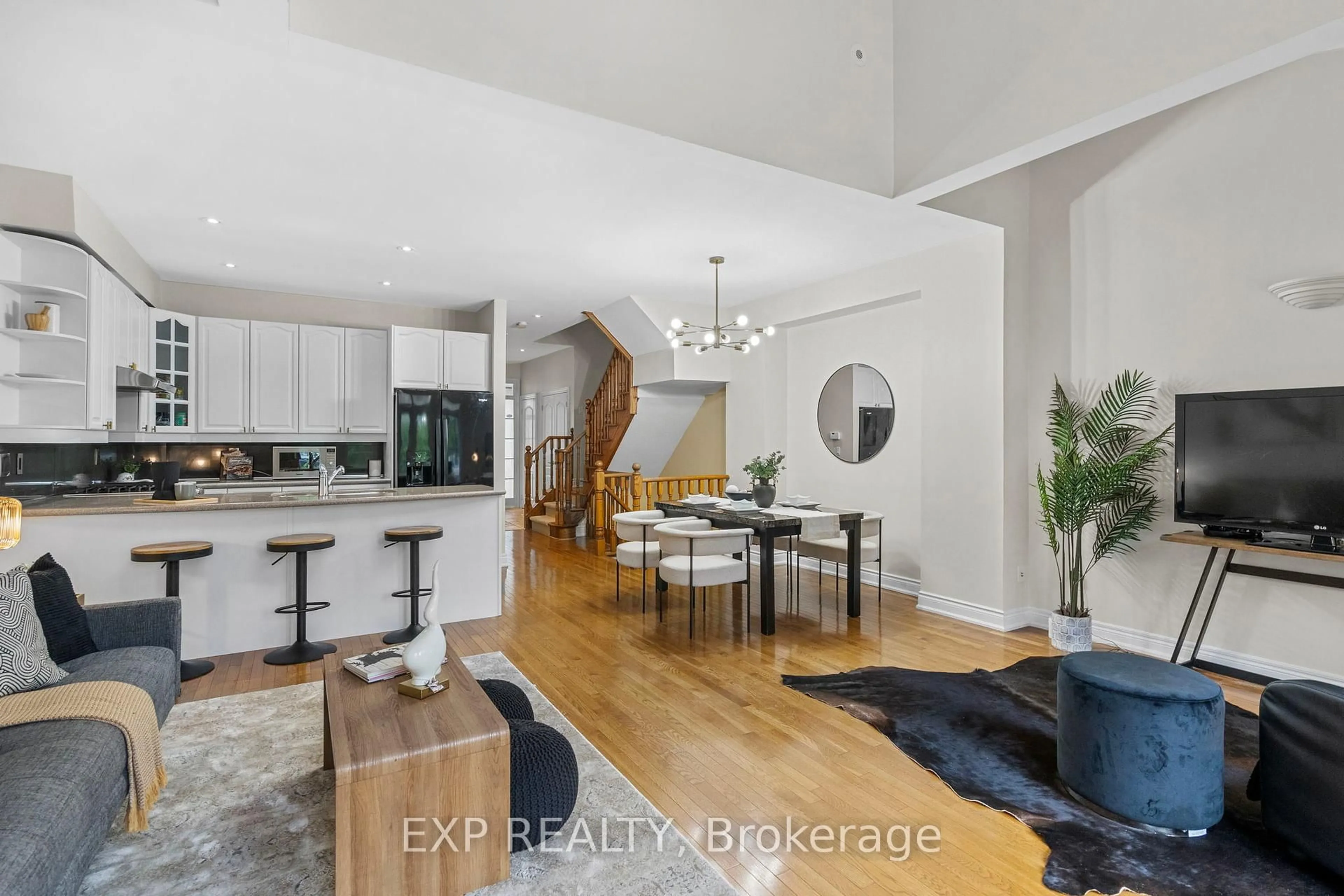 Open concept kitchen, wood/laminate floor for 1295 Wharf St #30, Pickering Ontario L1W 1A2
