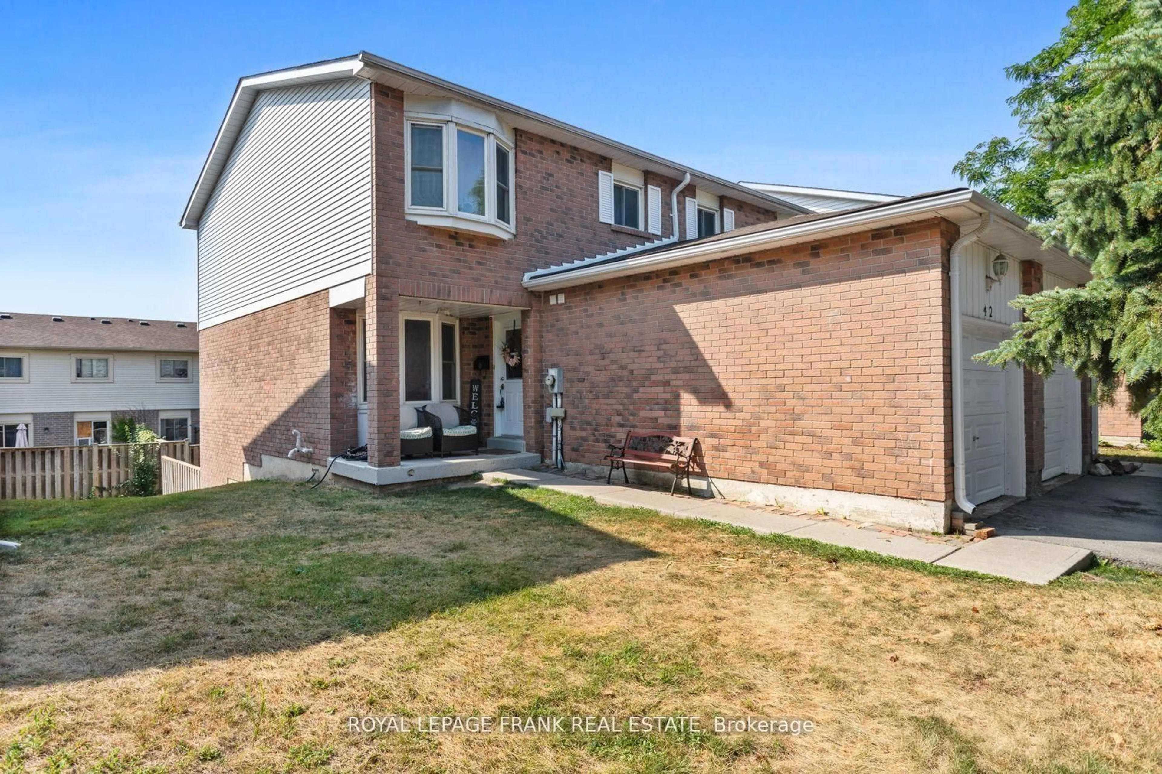 Home with brick exterior material, street for 700 Harmony Rd #42, Oshawa Ontario L1K 1S2