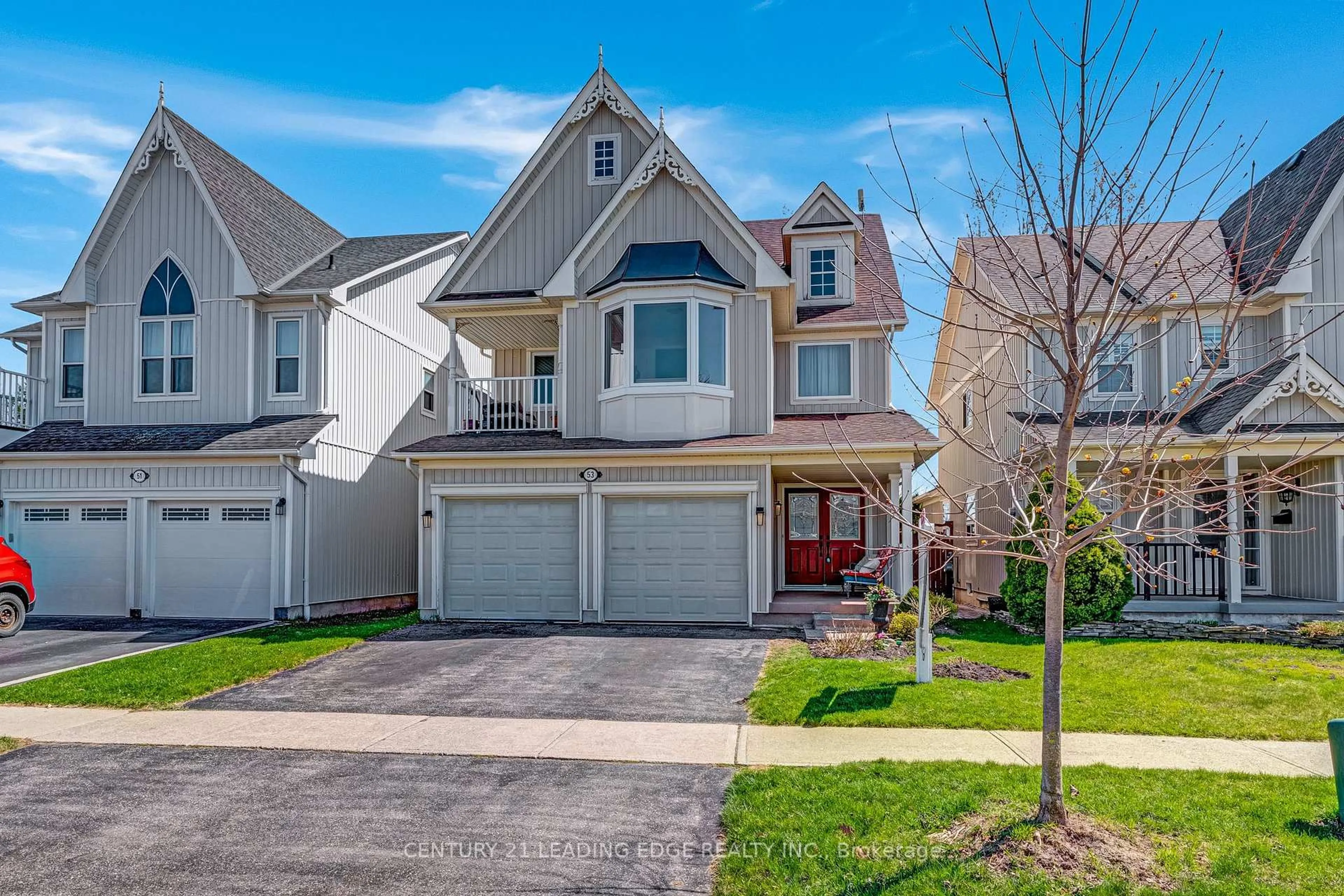 Home with vinyl exterior material, street for 53 Kinross Ave, Whitby Ontario L1M 2C4
