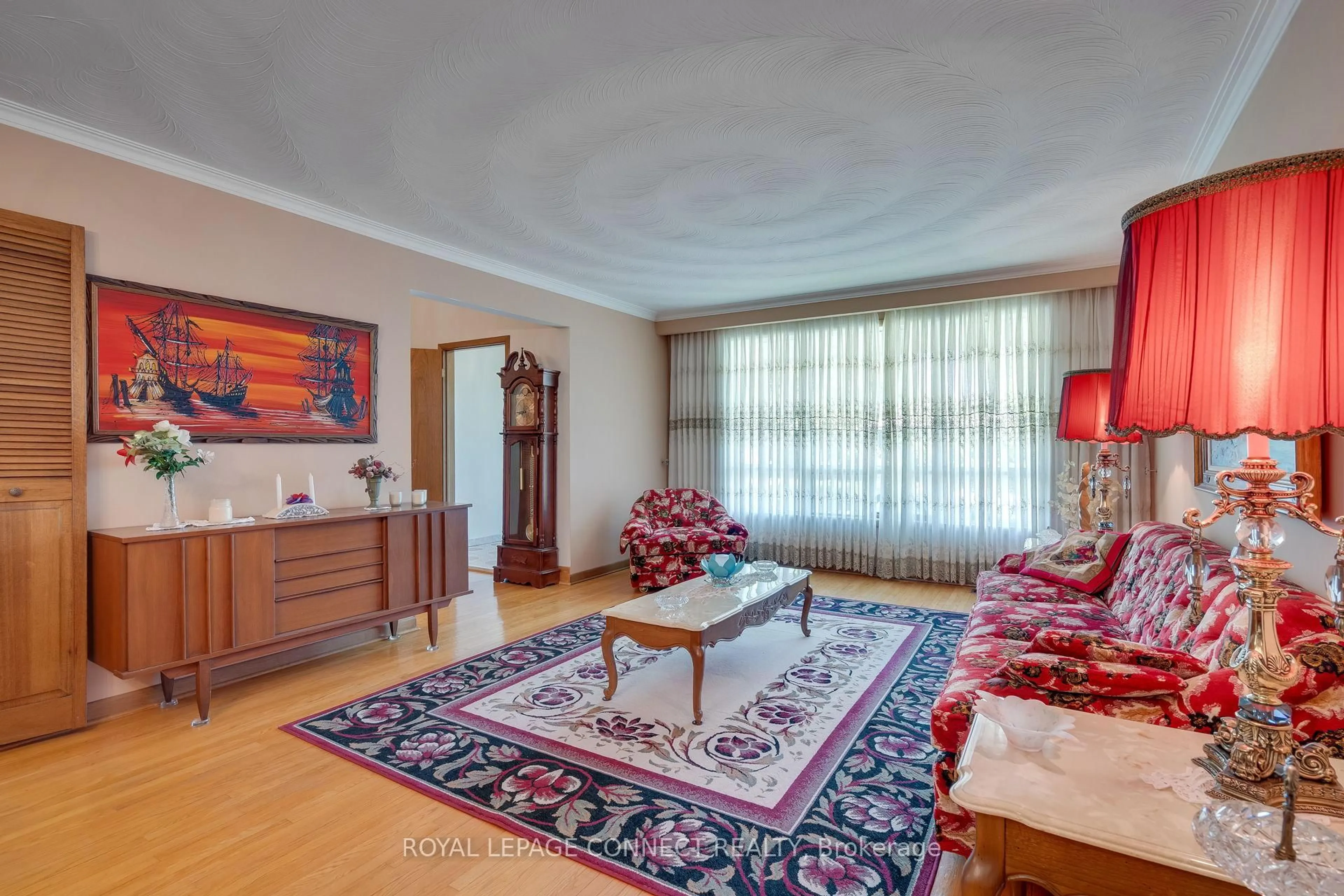 Living room with furniture, carpet floor for 17 Altair Ave, Toronto Ontario M1W 2R1