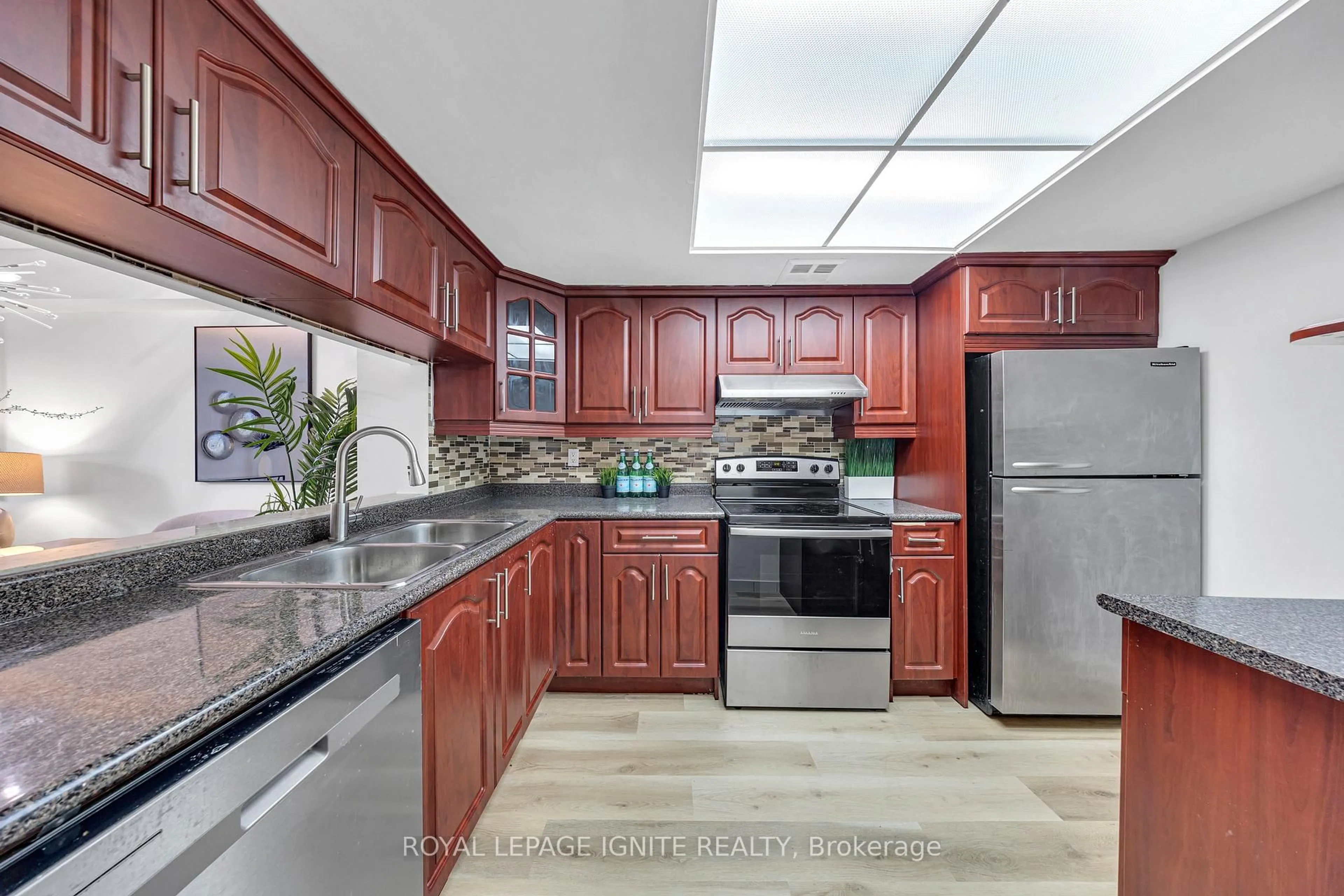 Standard kitchen, ceramic/tile floor for 88 Alton Towers Circ #215, Toronto Ontario M1V 5C5