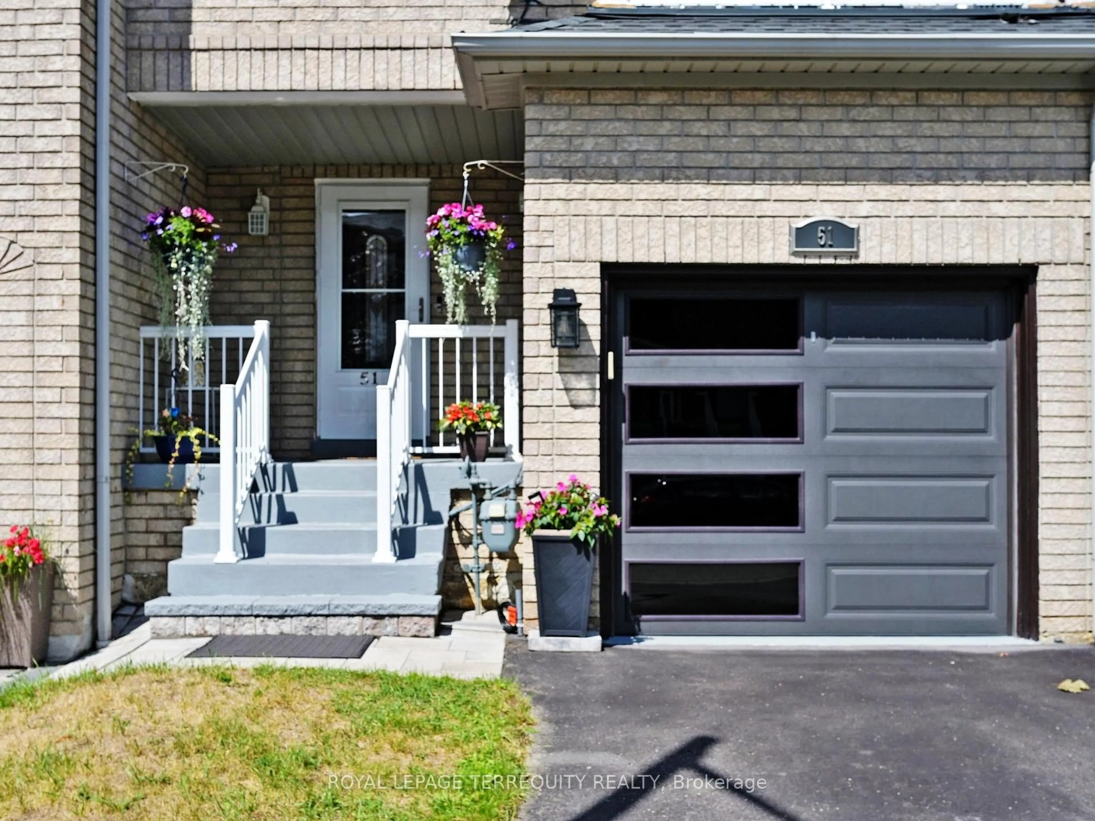 Home with brick exterior material, street for 51 Tasker Cres, Ajax Ontario L1Z 1N8