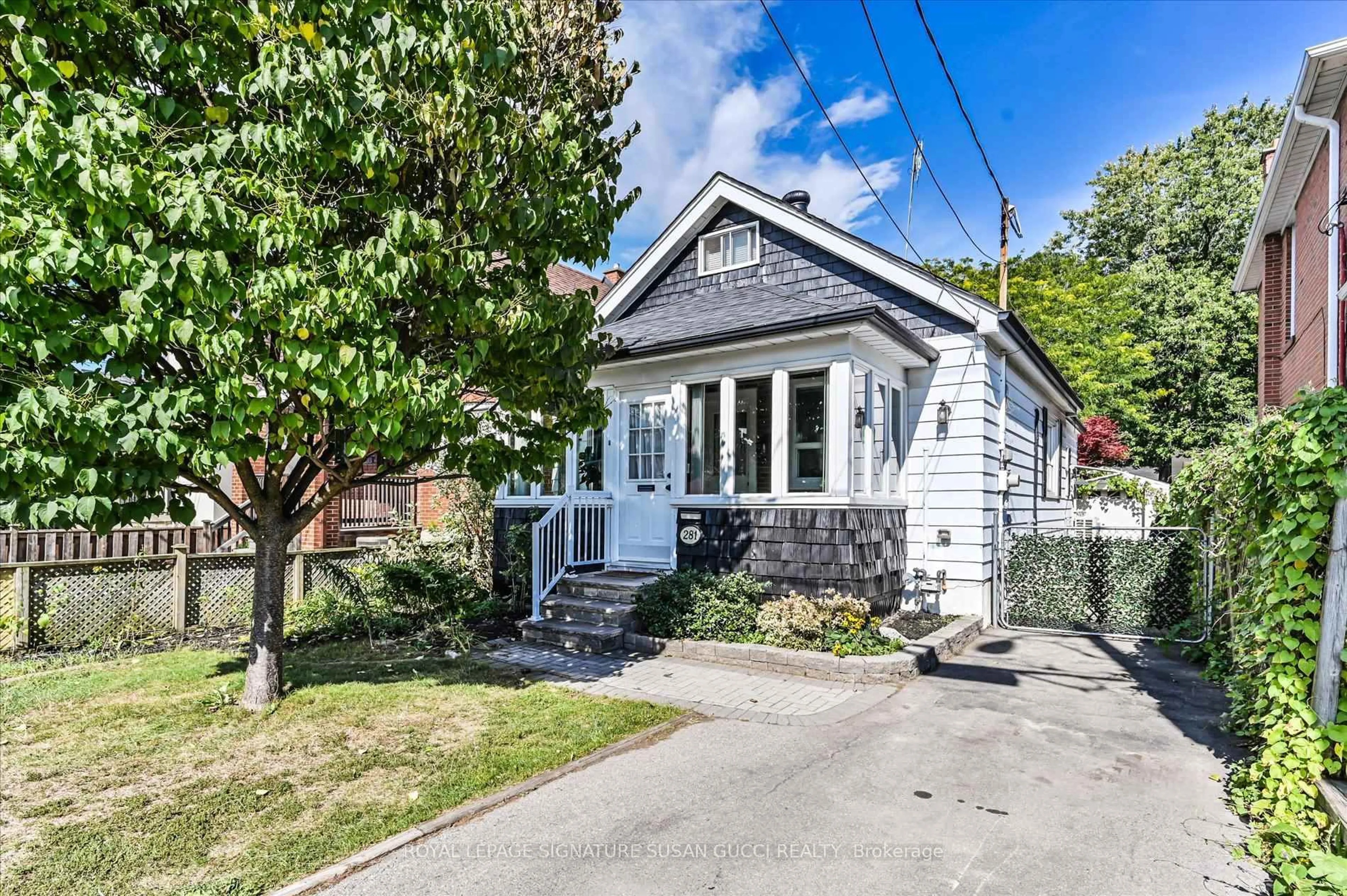 A pic from outside/outdoor area/front of a property/back of a property/a pic from drone, street for 281 Westlake Ave, Toronto Ontario M4C 4T7