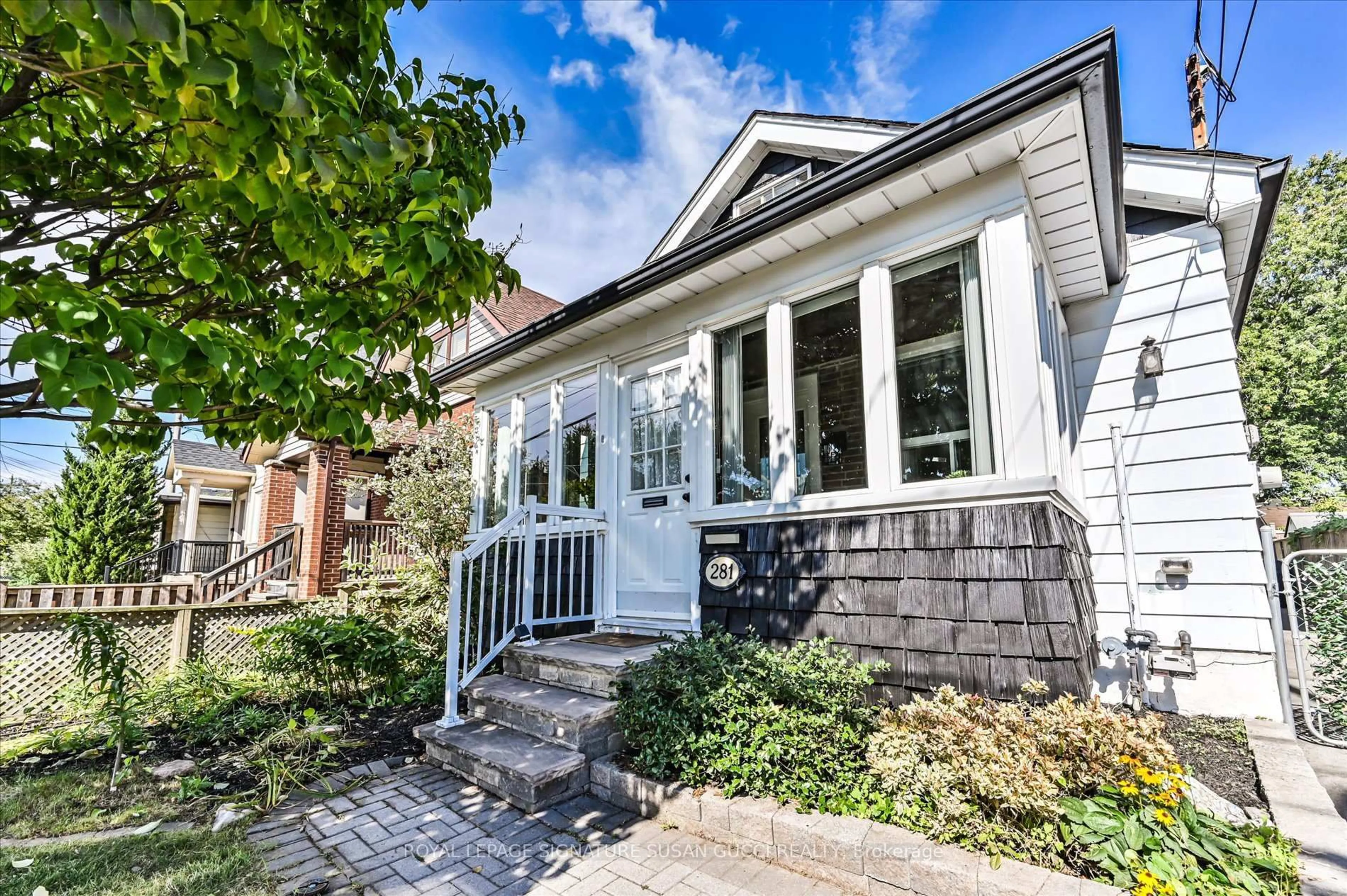 Home with brick exterior material, street for 281 Westlake Ave, Toronto Ontario M4C 4T7
