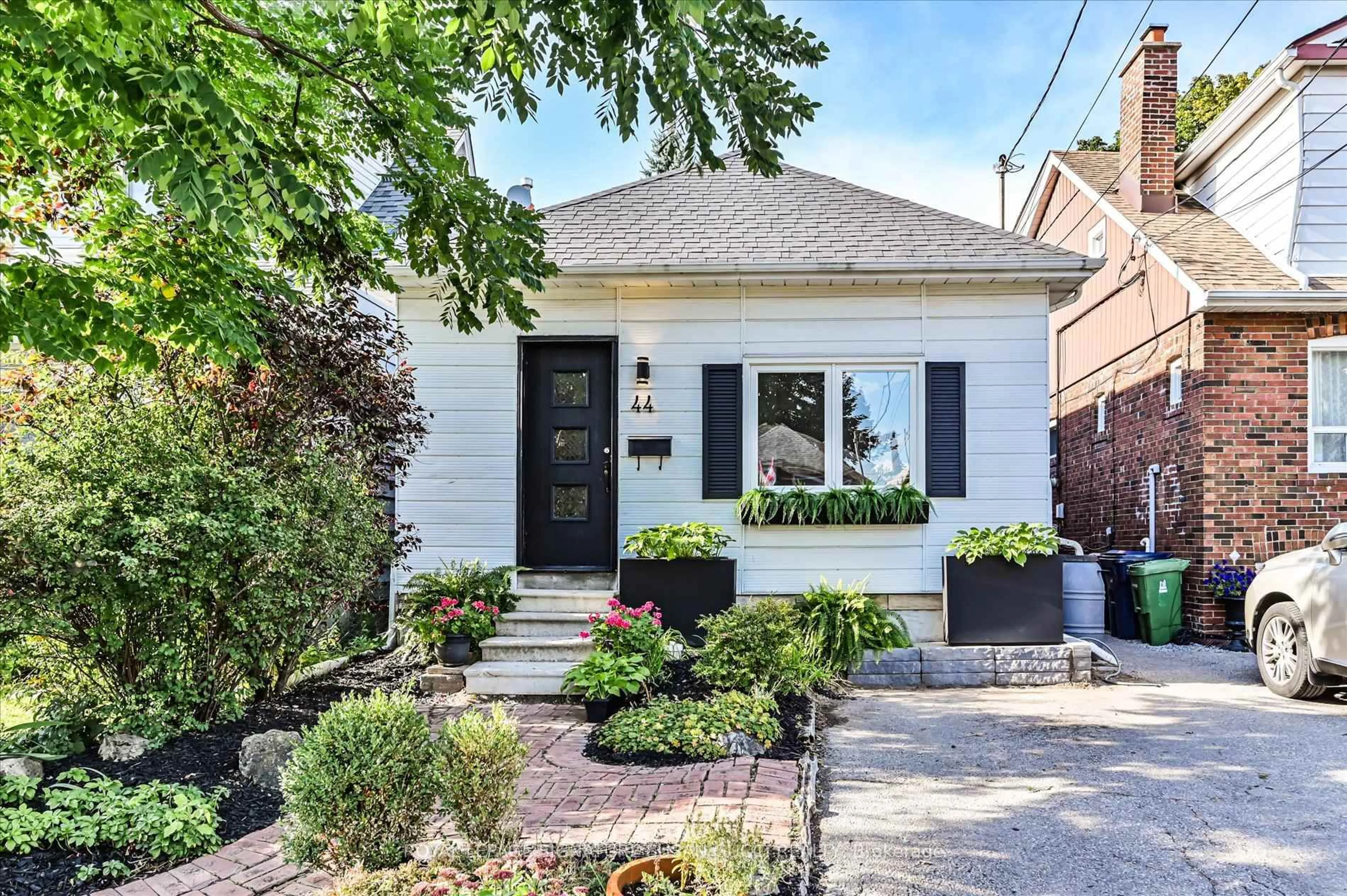 Home with brick exterior material, street for 44 Crewe Ave, Toronto Ontario M4C 2J3