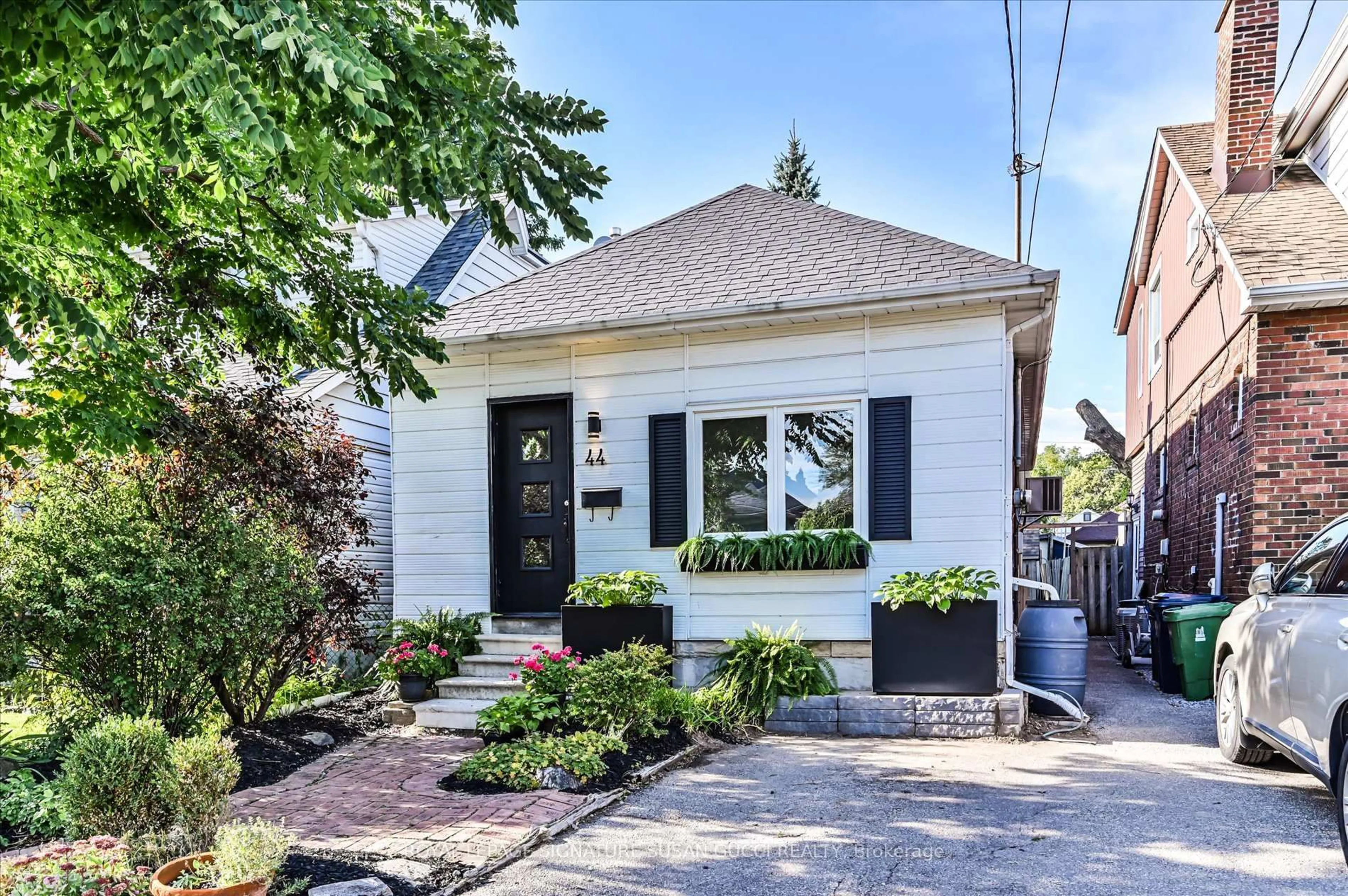 Home with brick exterior material, street for 44 Crewe Ave, Toronto Ontario M4C 2J3