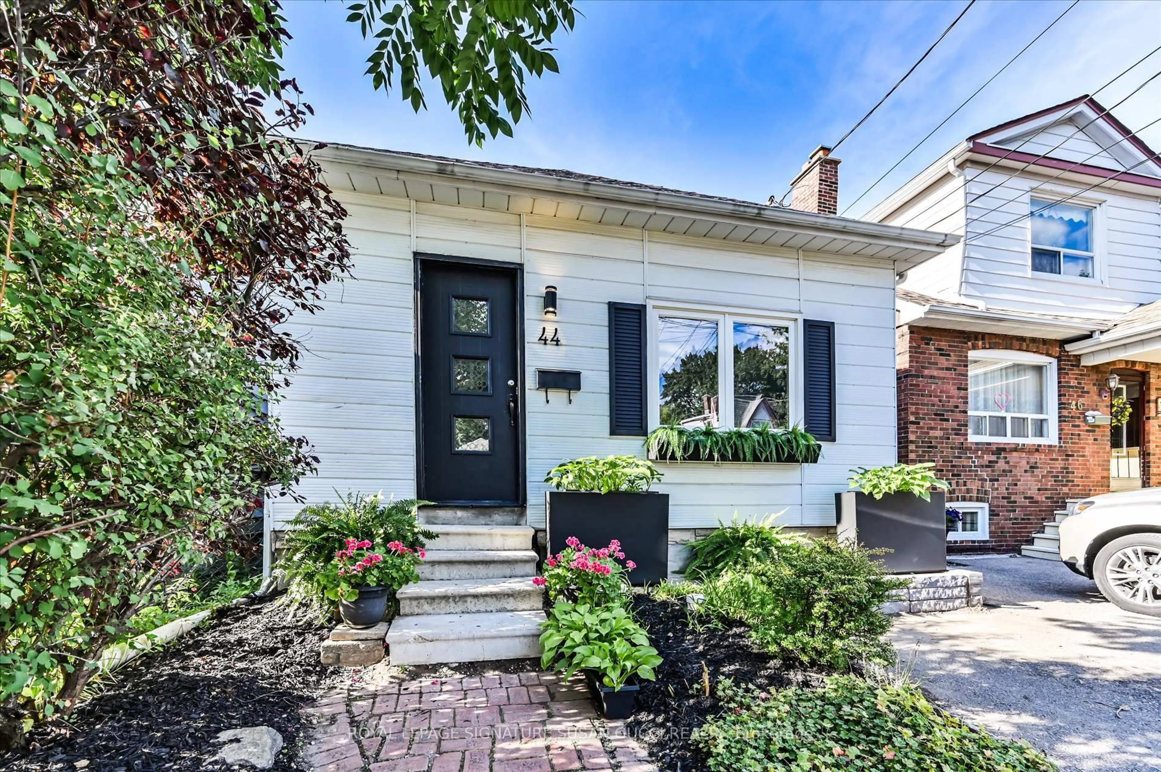 Home with brick exterior material, street for 44 Crewe Ave, Toronto Ontario M4C 2J3