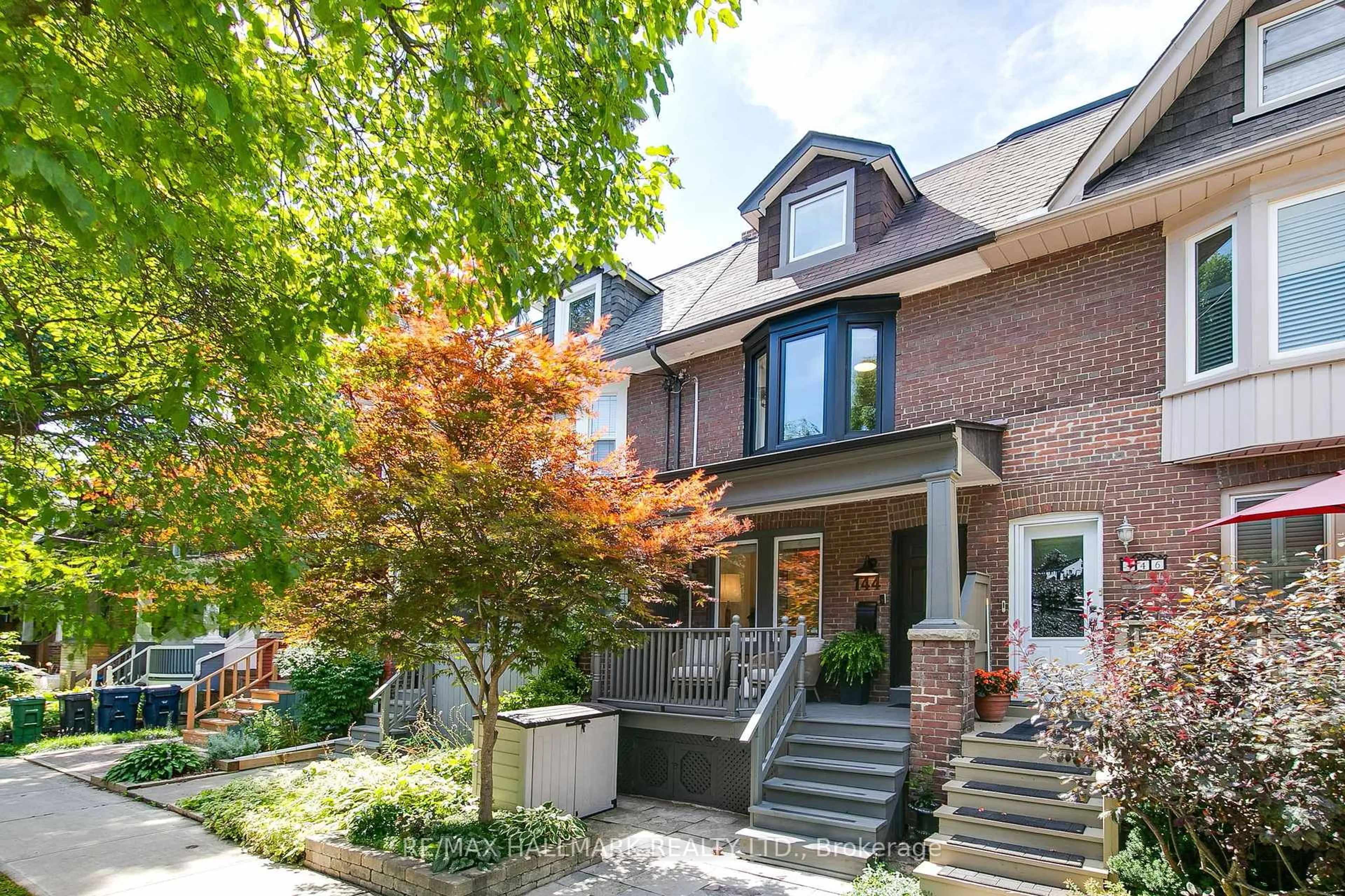 Home with brick exterior material, street for 144 Langford Ave, Toronto Ontario M4J 3E3
