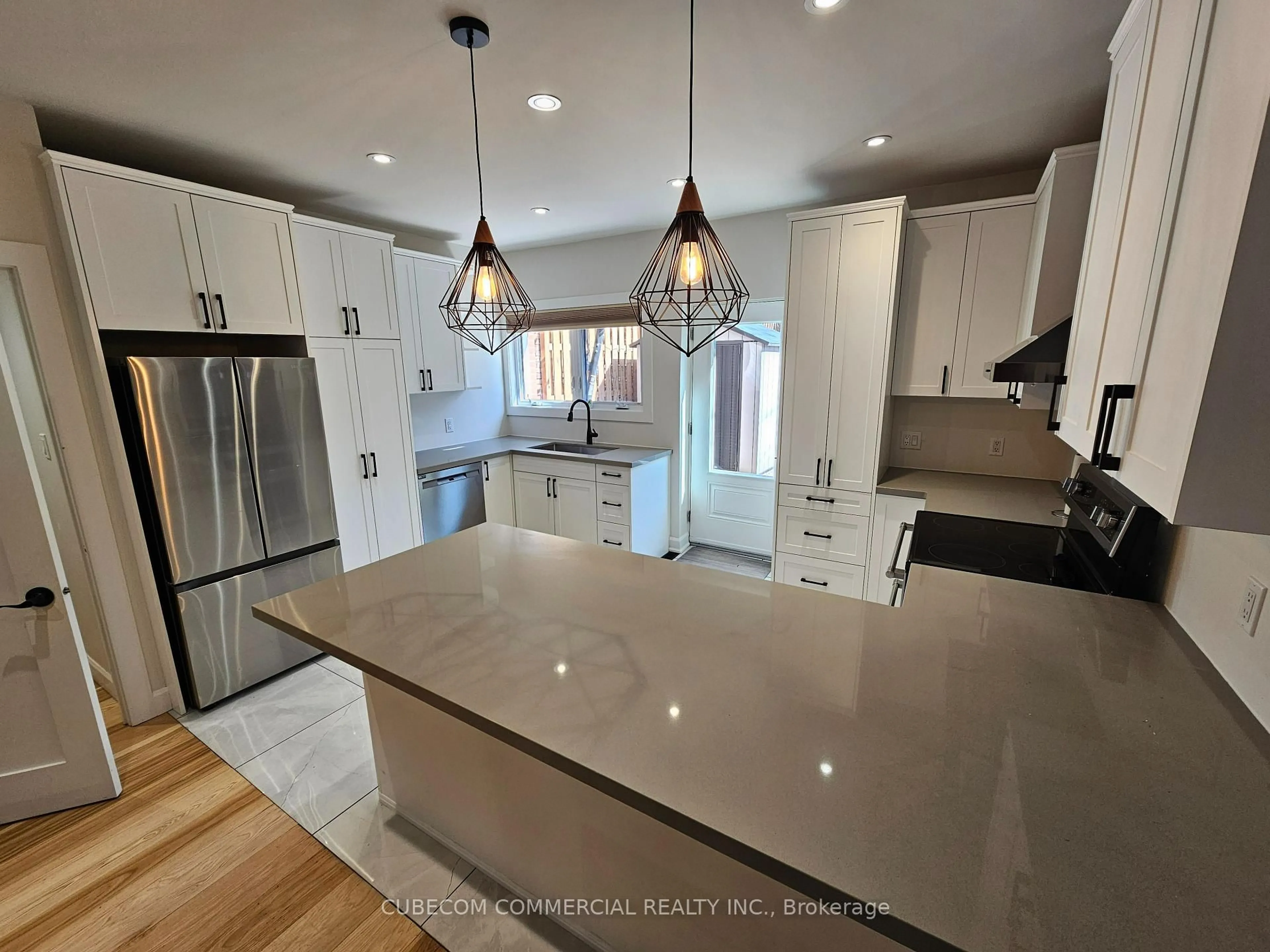 Open concept kitchen, unknown for 647 Logan Ave, Toronto Ontario M4K 3C4