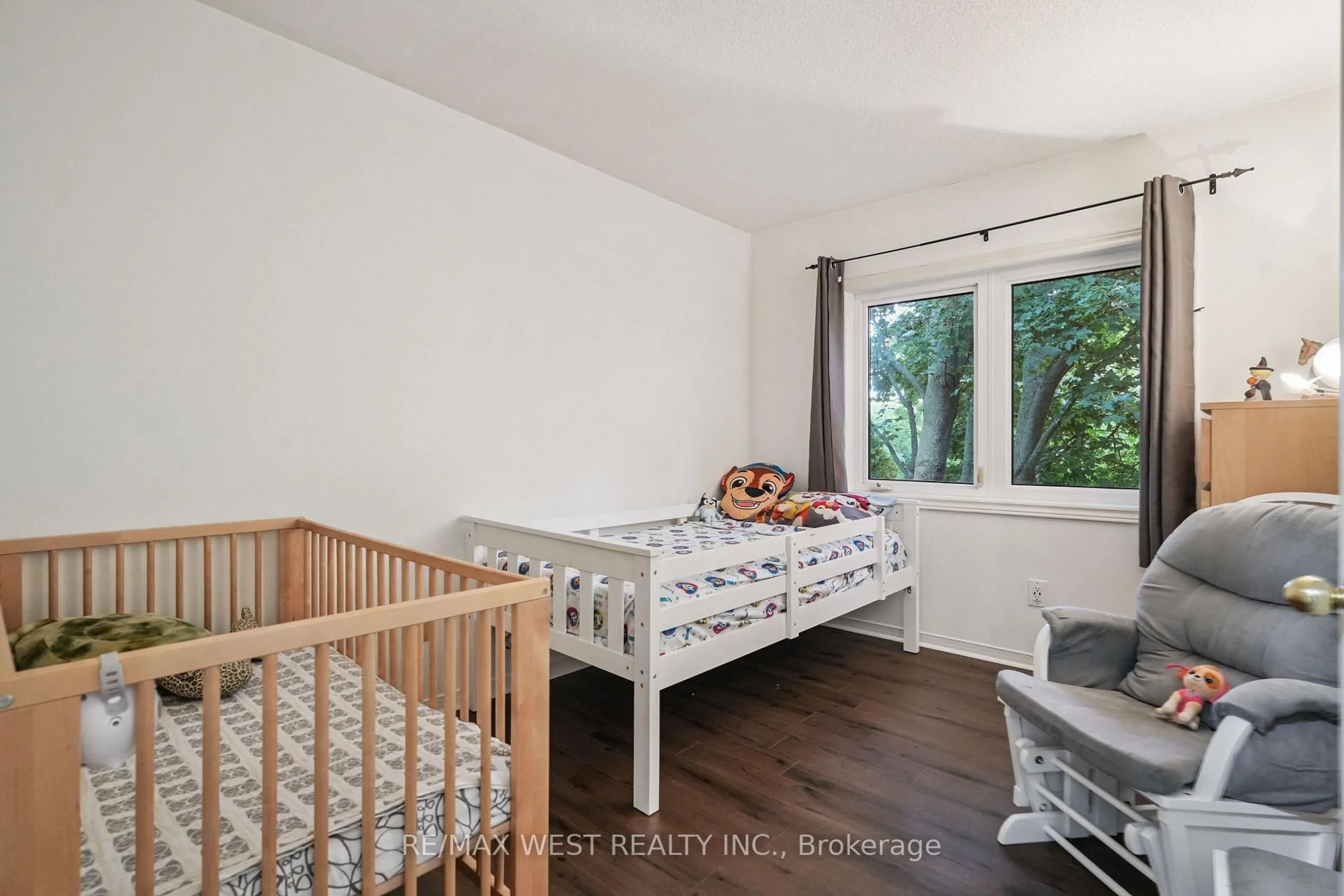 Bedroom with bed, wood/laminate floor for 6157 Kingston Rd #23, Toronto Ontario M1C 4Z3