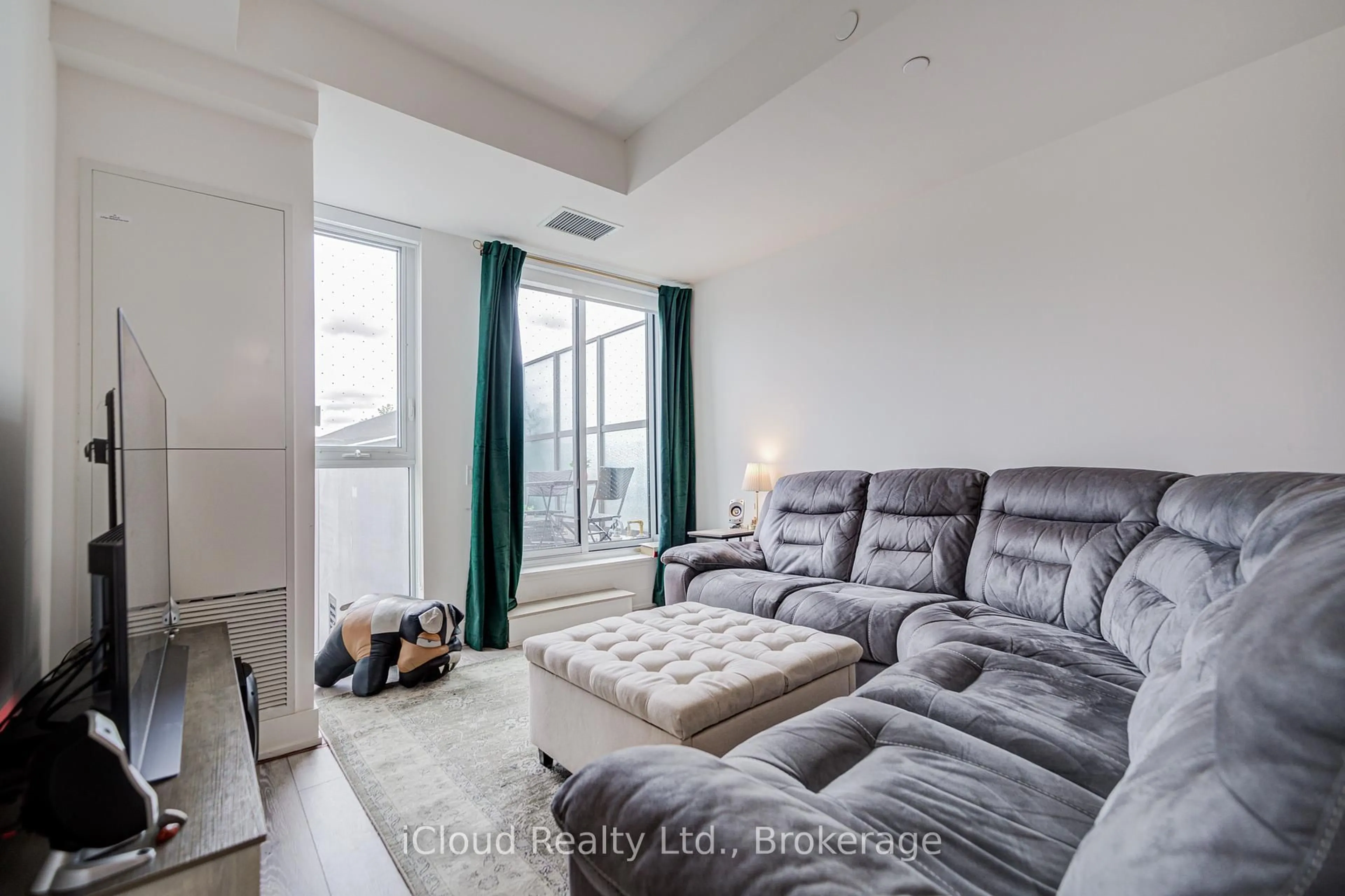 Living room with furniture, unknown for 1285 Queen St #211, Toronto Ontario M4L 1C2