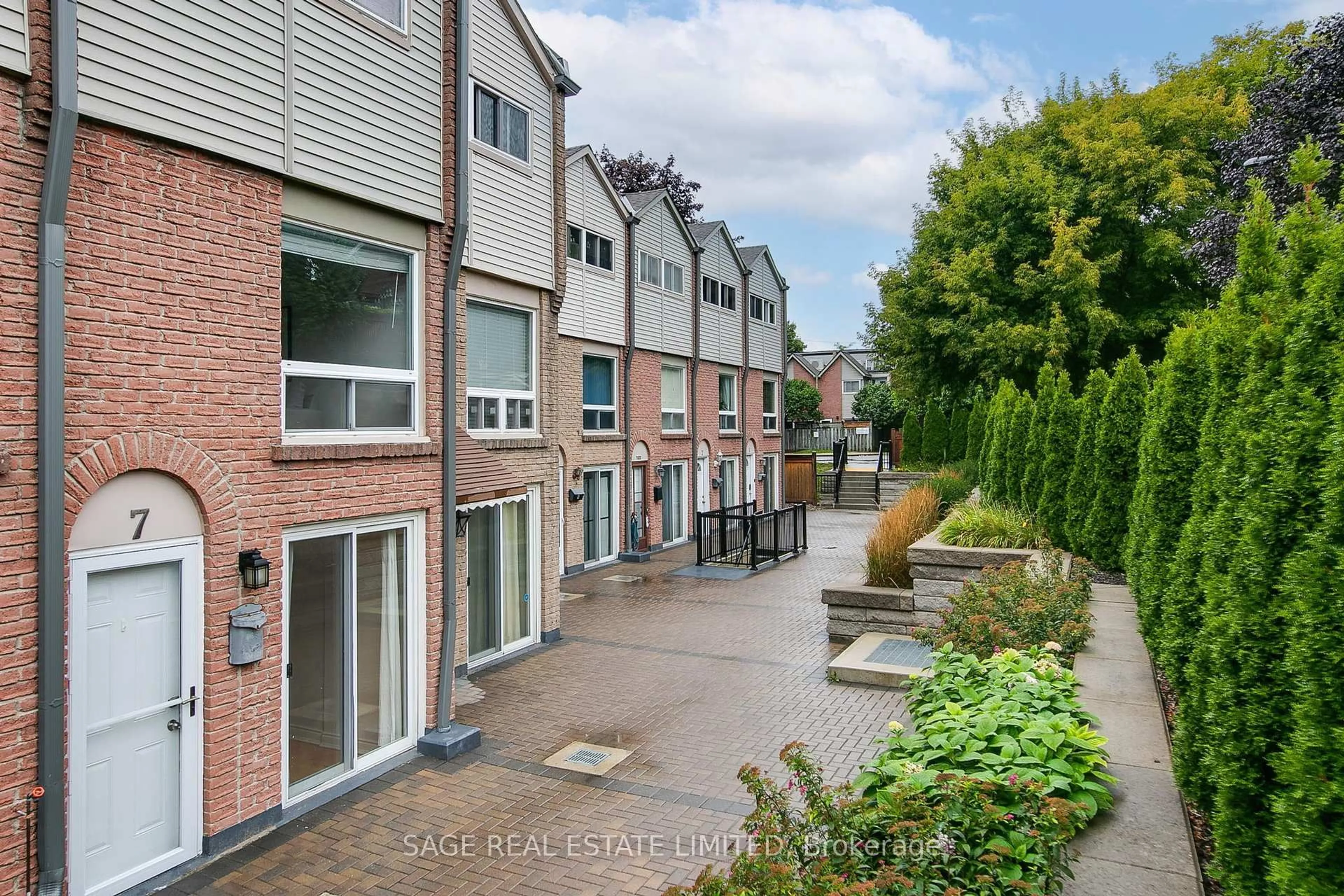 A pic from outside/outdoor area/front of a property/back of a property/a pic from drone, street for 1666 Queen St #7, Toronto Ontario M4L 1G3