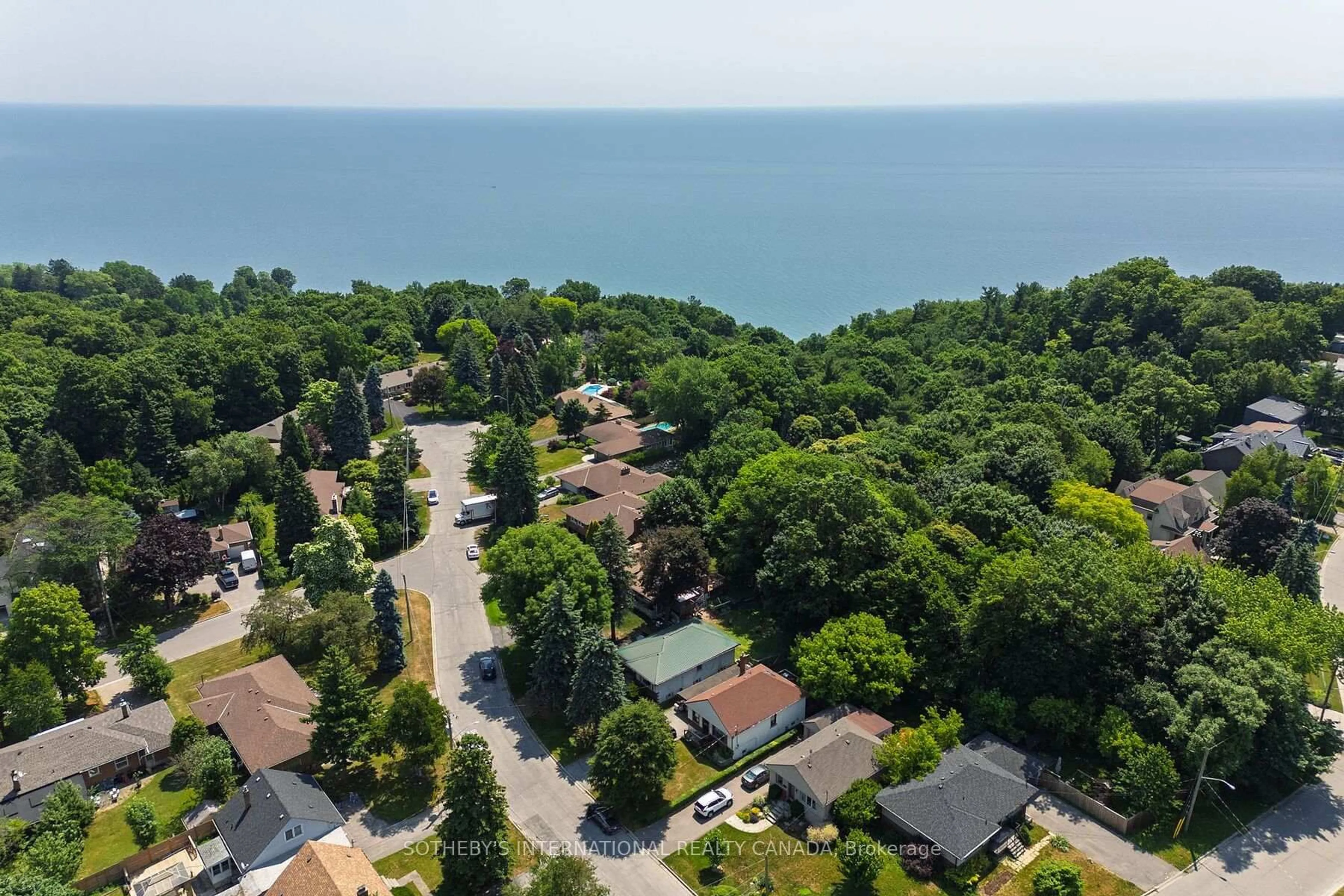 A pic from outside/outdoor area/front of a property/back of a property/a pic from drone, water/lake/river/ocean view for 17 Ayre Point Rd, Toronto Ontario M1M 1G4
