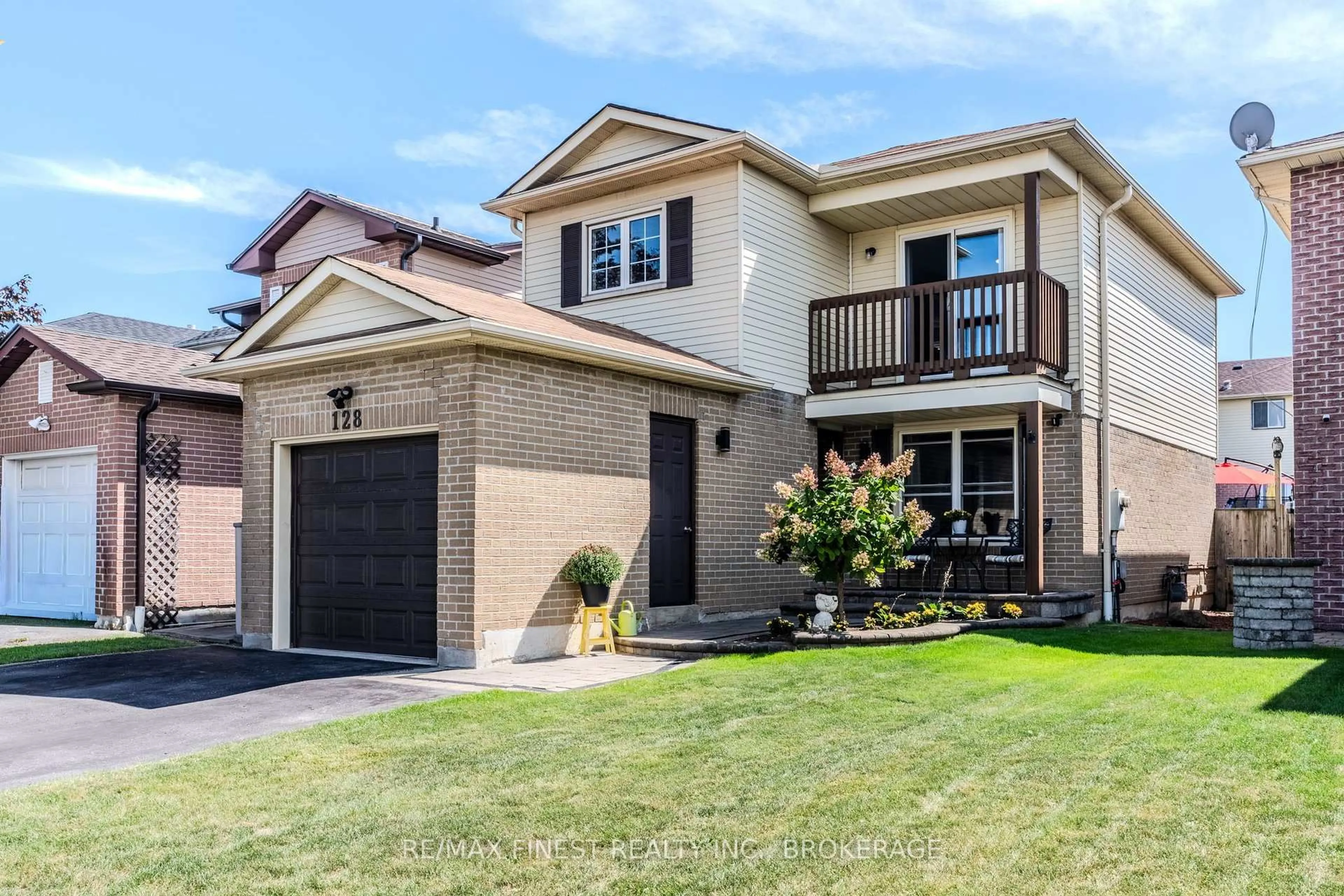 Home with brick exterior material, street for 128 Reed Dr, Ajax Ontario L1S 6V2