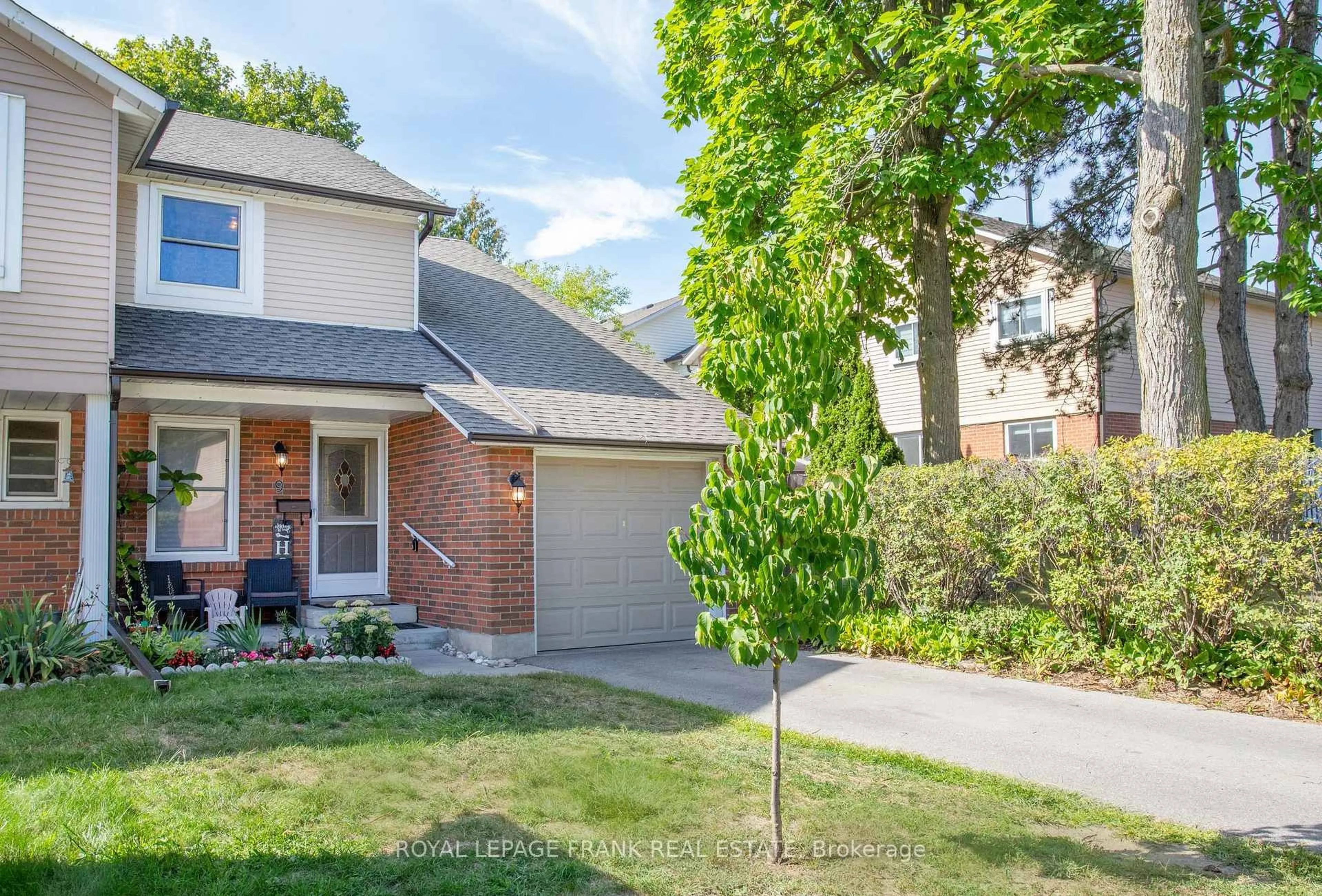 Home with brick exterior material, street for 1055 Central Park Blvd #9, Oshawa Ontario L1G 7M4