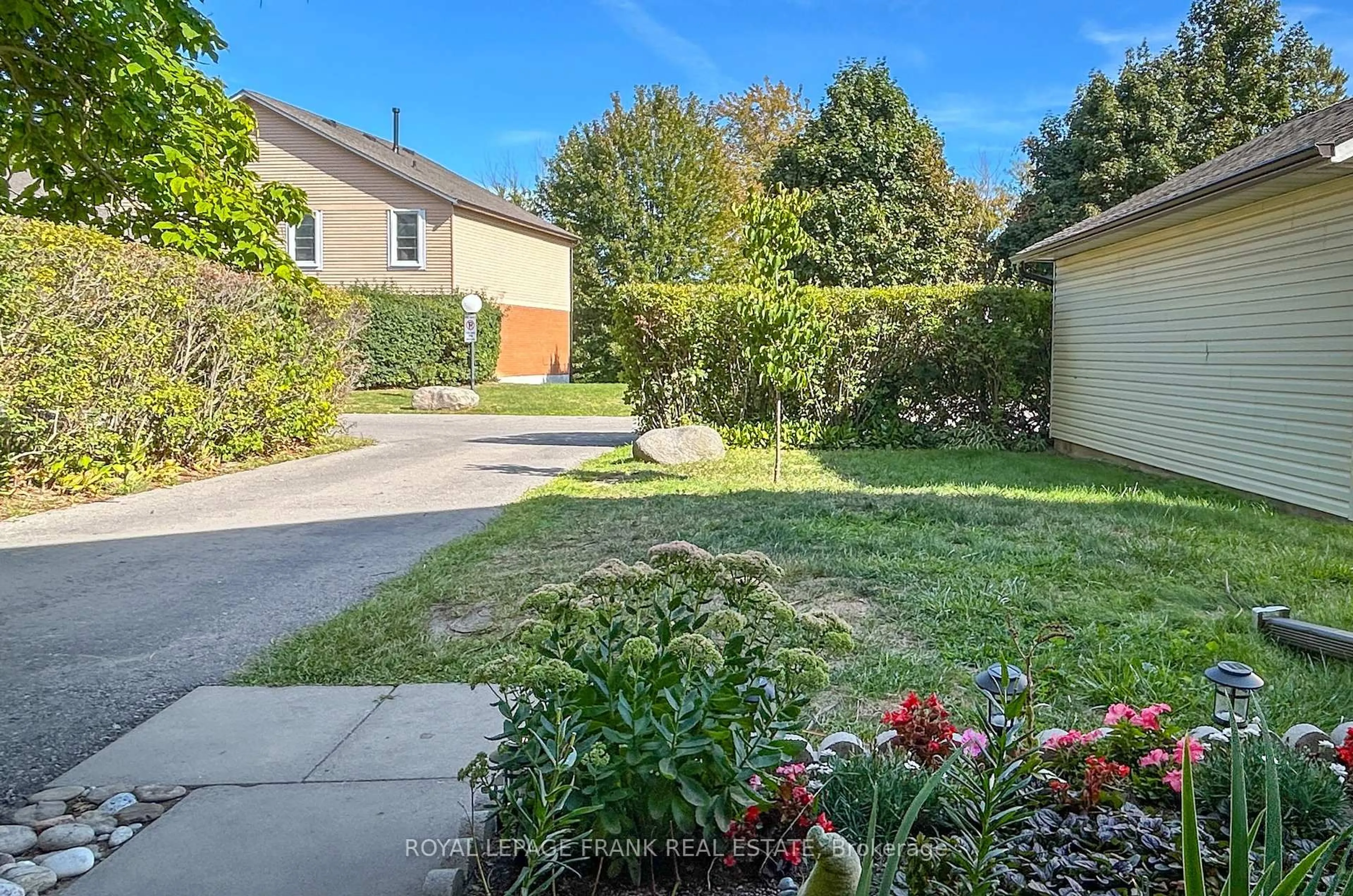 A pic from outside/outdoor area/front of a property/back of a property/a pic from drone, street for 1055 Central Park Blvd #9, Oshawa Ontario L1G 7M4