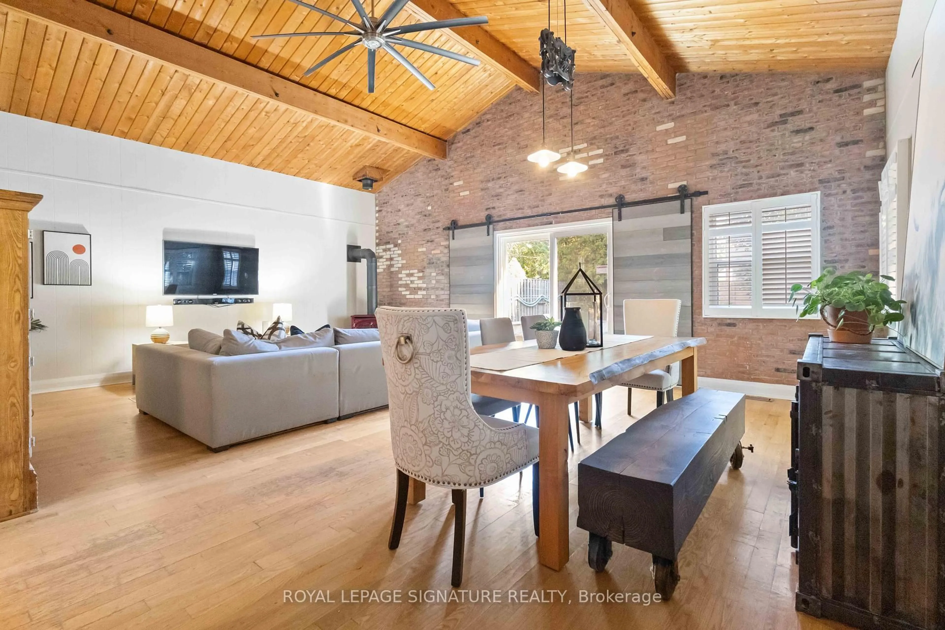Open concept kitchen, wood/laminate floor for 83 Harewood Ave, Toronto Ontario M1M 2R4